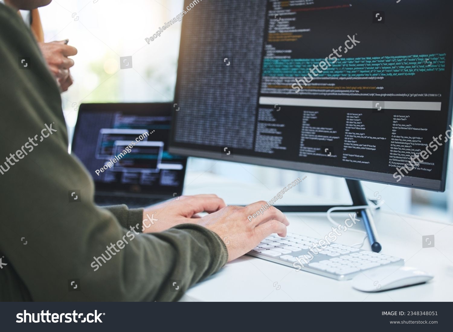 Programming, developer and hands on computer for coding, software script or cyber security in office. Closeup of IT technician person with technology for typing code, future and data analytics #2348348051