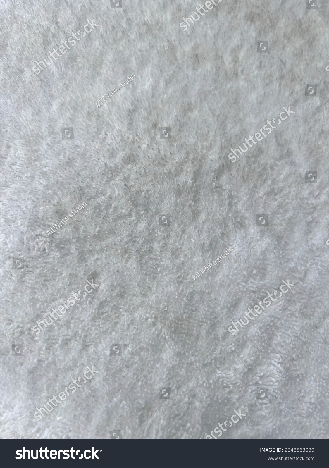 Gray fluffy textile surface, fur fabric. Grey fur. Abstract fabric background. Gray warm cloth concept for background. Fluffy texture. Grey carpet texture. High quality photos. #2348563039
