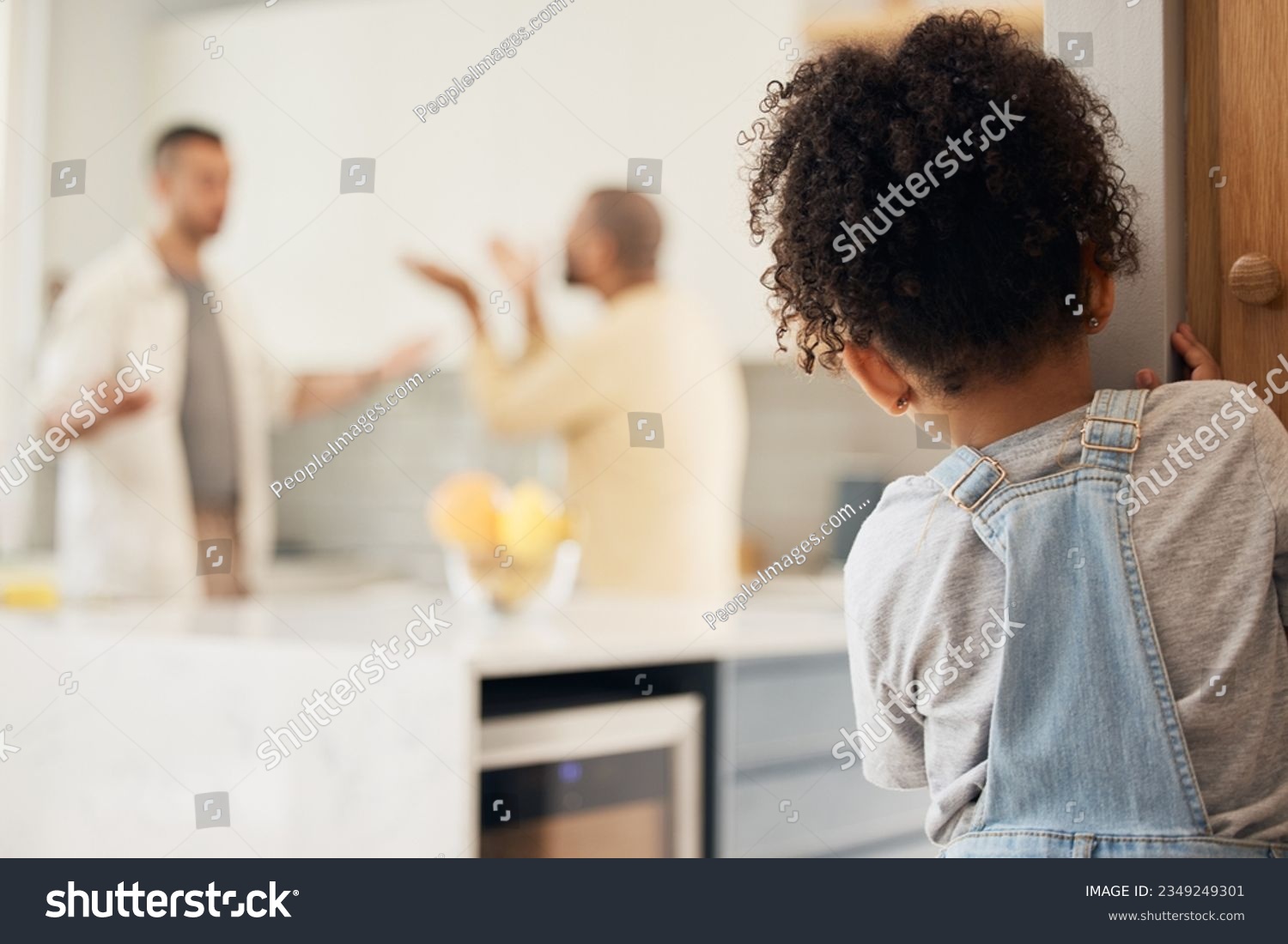 Lgbt, divorce and girl child watching gay parents argue in kitchen with stress, worry or fear in their home. Family, crisis and homosexual men dispute foster kid custody, affair or conflict in house #2349249301