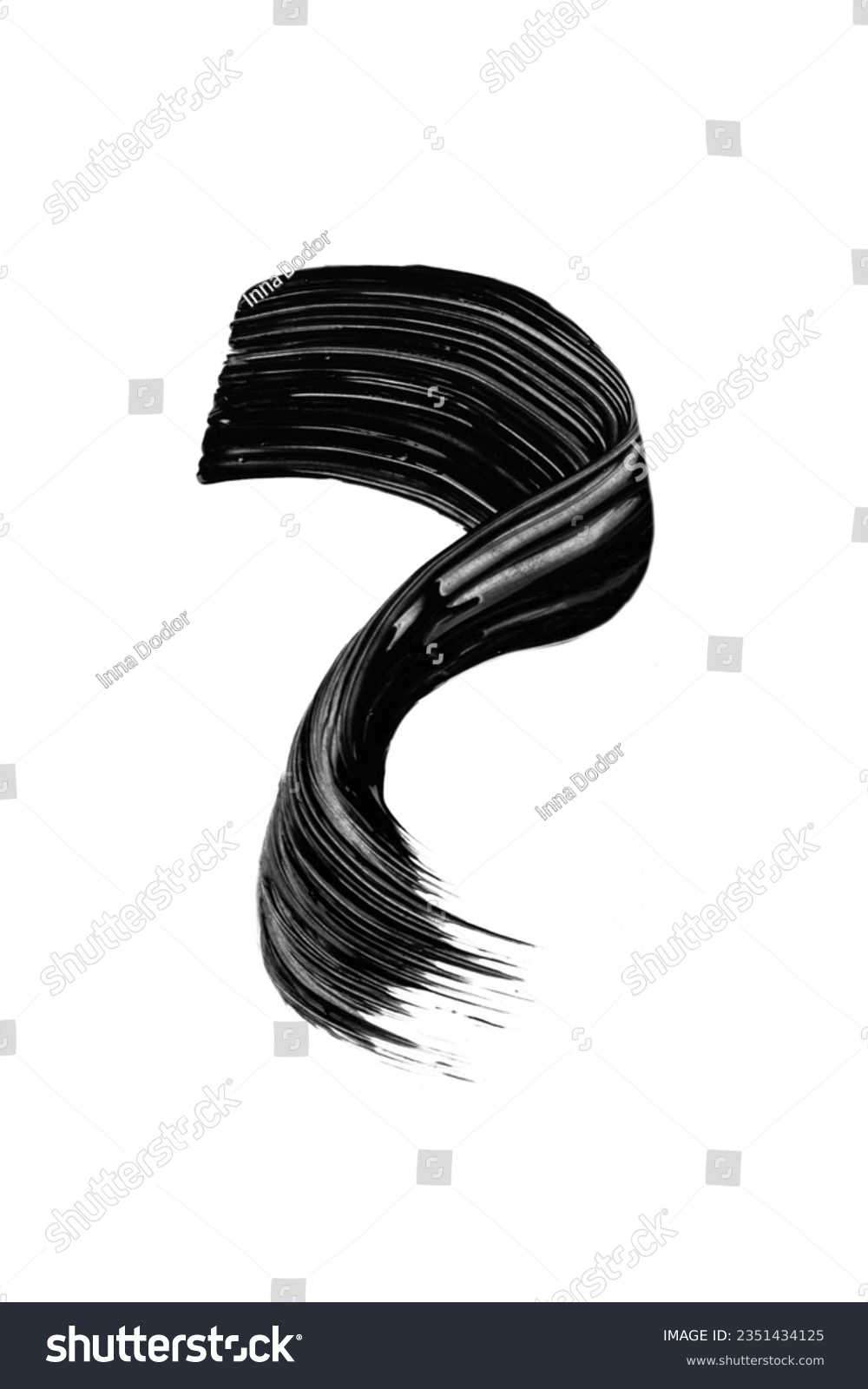 Black mascara brushstroke swatch isolated on white background. Cosmetic mascara smudged smear for design. #2351434125