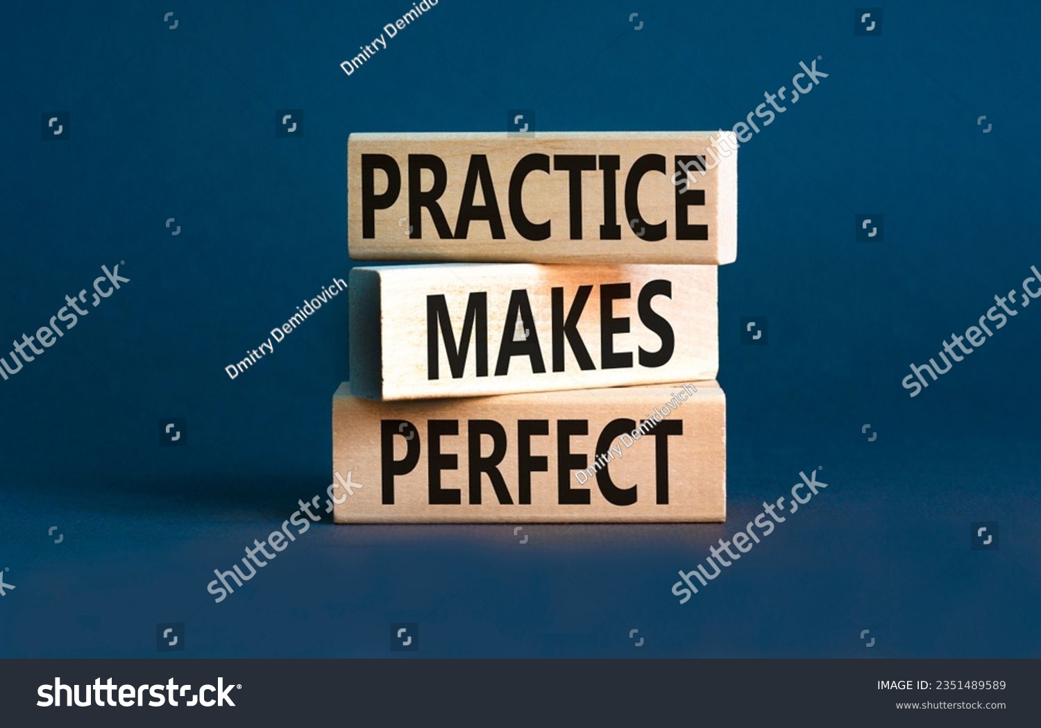 Practice makes perfect symbol. Concept words Practice makes perfect on wooden block. Beautiful grey table grey background. Business practice makes perfect concept. Copy space. #2351489589