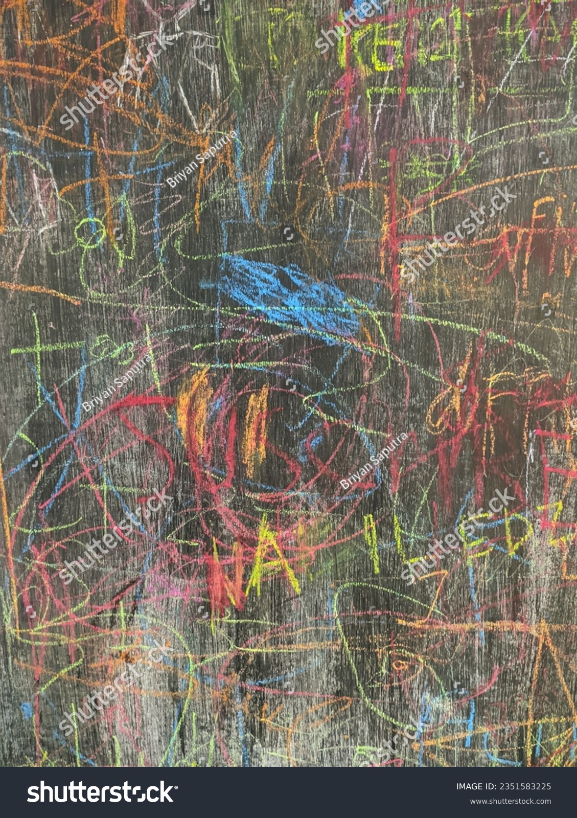 Colorful doodles on a blackboard, crossed out with colored chalk. #2351583225