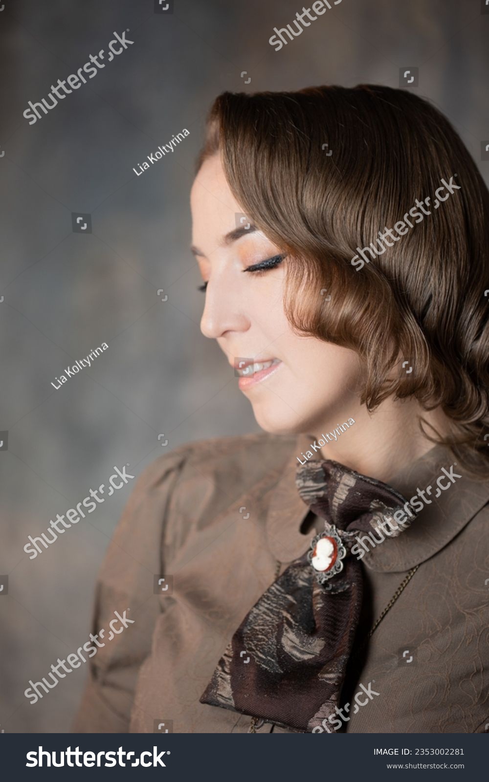 Stylish lady in an elegant suit in Victorian style, suit with steampunk elements, close-up portrait #2353002281