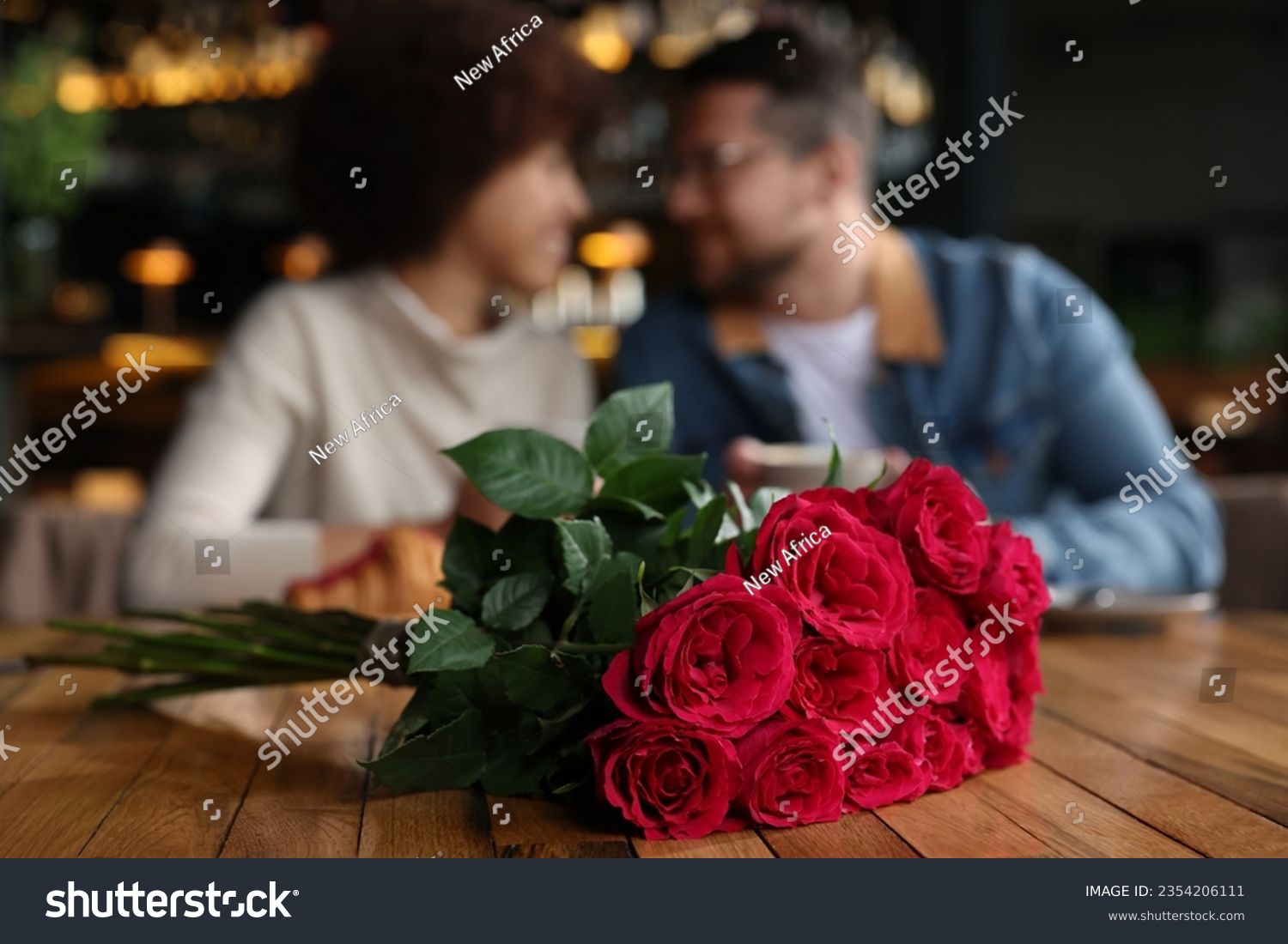 International dating. Happy couple spending time together in restaurant, selective focus #2354206111