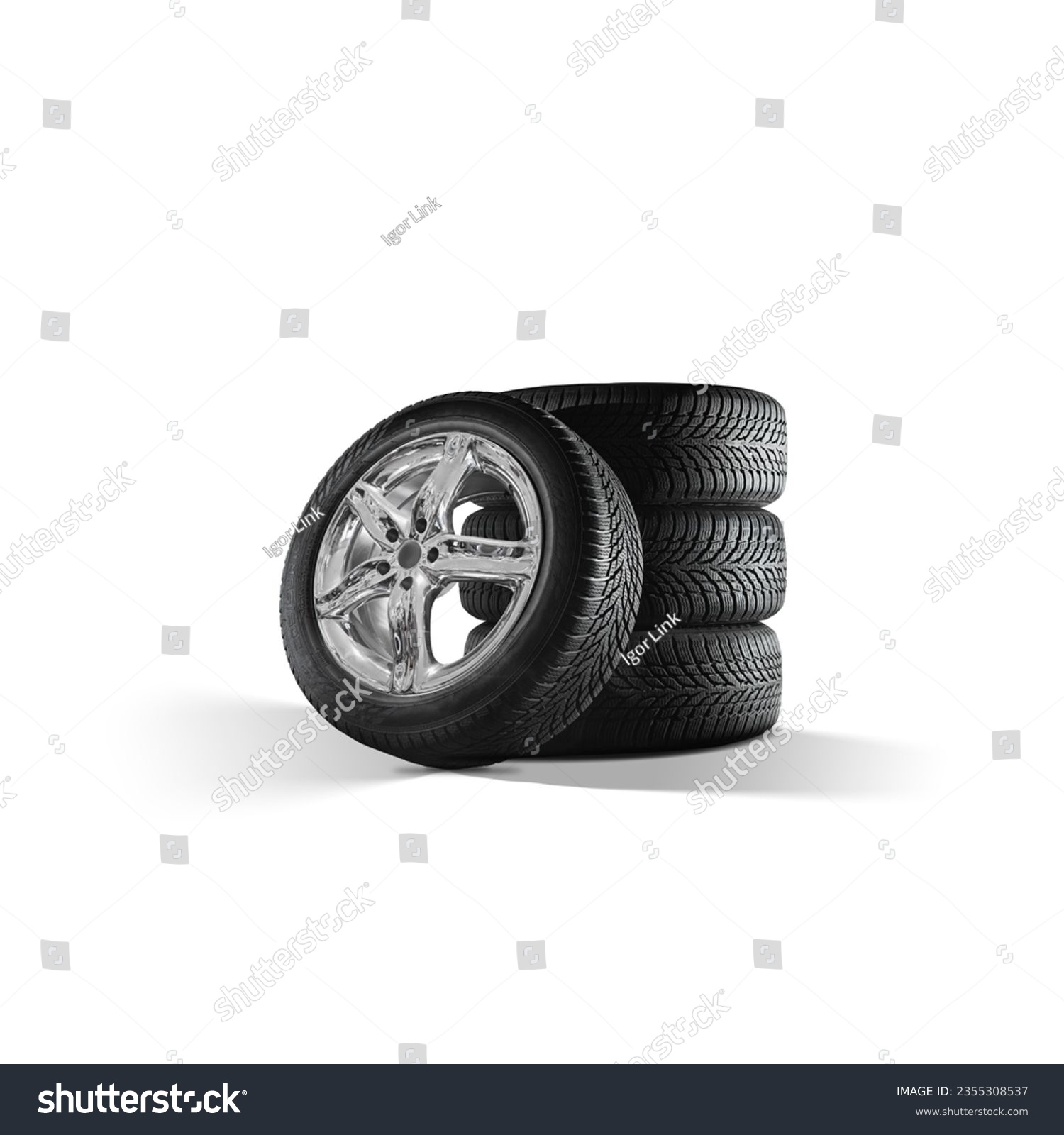 Car tires with a great profile and shiny chrome alloy wheels on isolated white Background.  Set of summer or winter tyres in front of white fond. #2355308537
