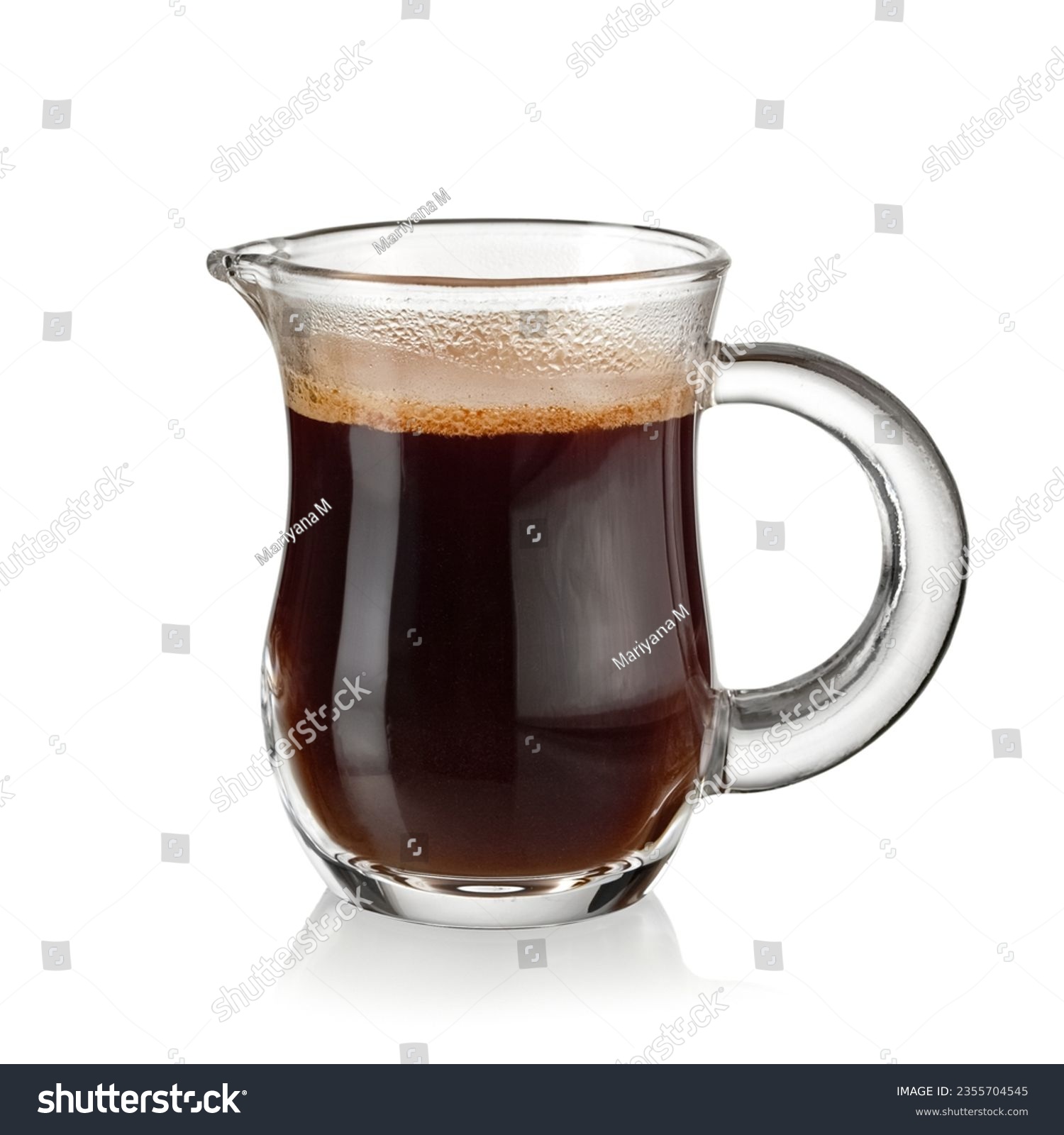 Hot espresso coffee in a small glass jug on white background #2355704545