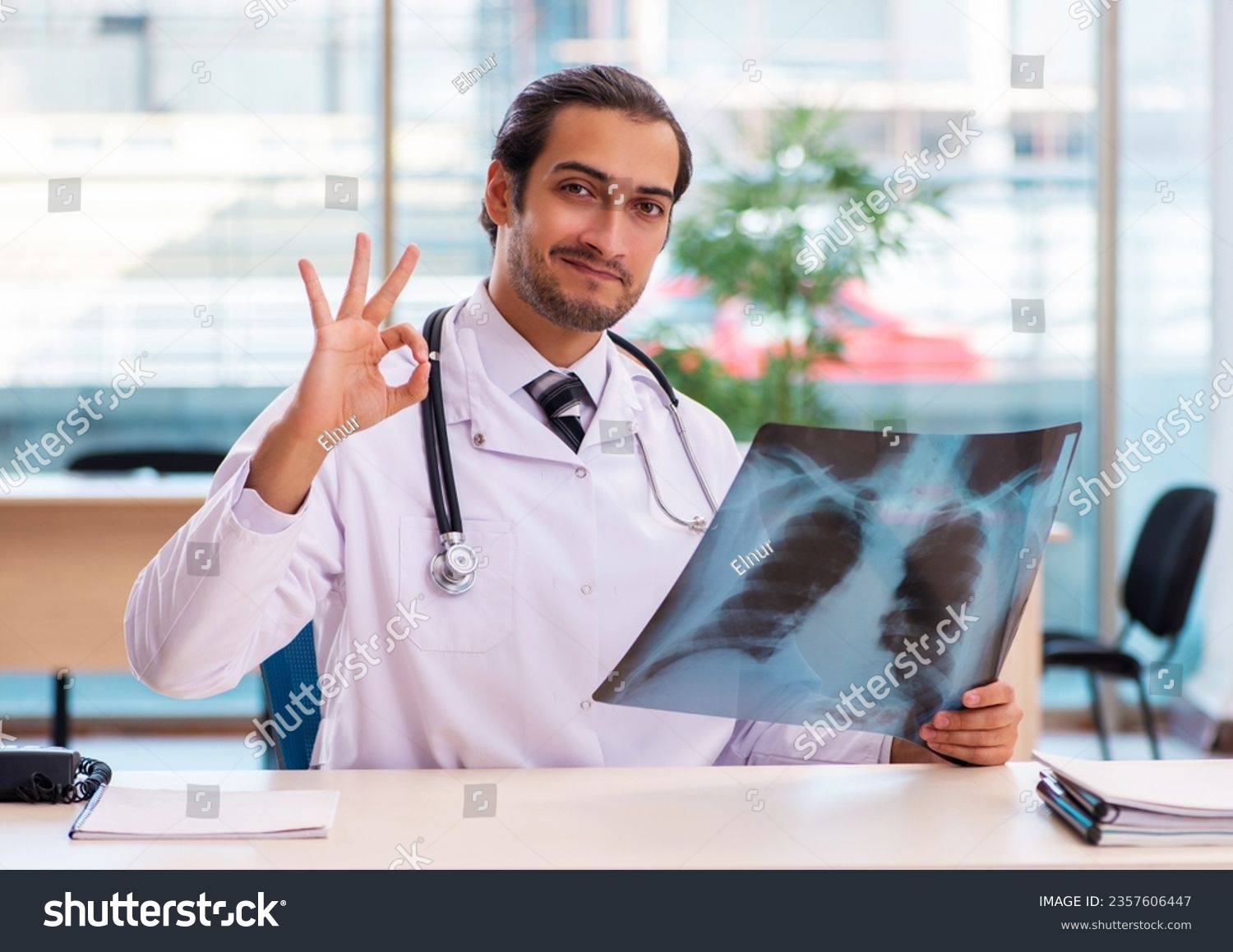 Young male doctor radiologist working in the clinic #2357606447