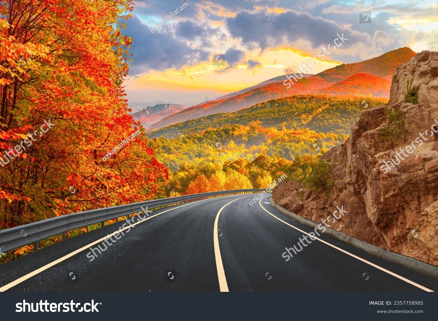 Black asphalt road landscape at sunset in beautiful colorful nature. Highway scenery among mountains in autumn season. Nature landscape on beautiful road in colorful fall. Autumn landscape in Germany. #2357758985