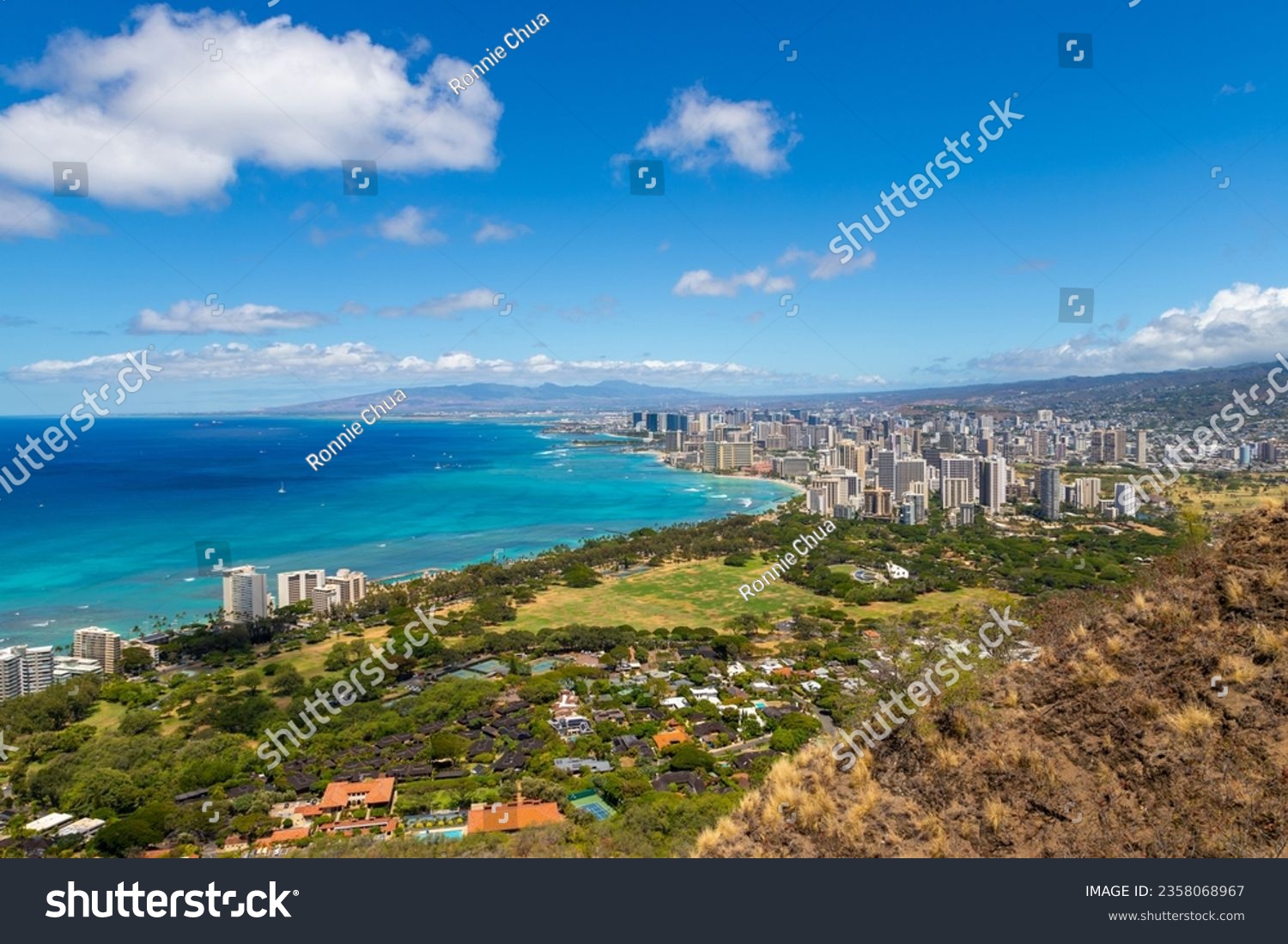 Wide angle view of Honolulu city from Diamond Head lookout, with Waikiki beach landscape and ocean views. #2358068967