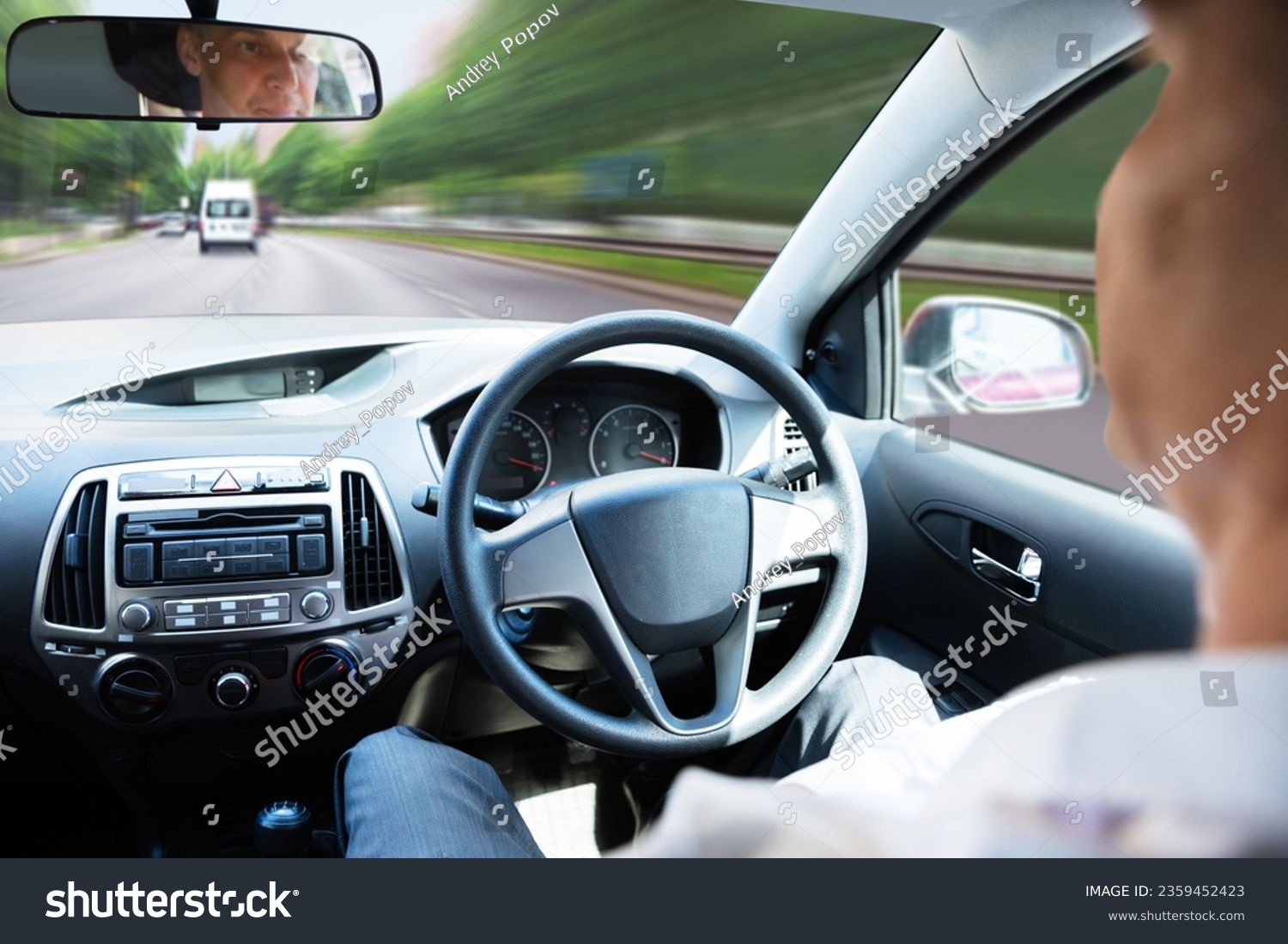 Close-up Of A Man Sitting In Self Driving Car #2359452423