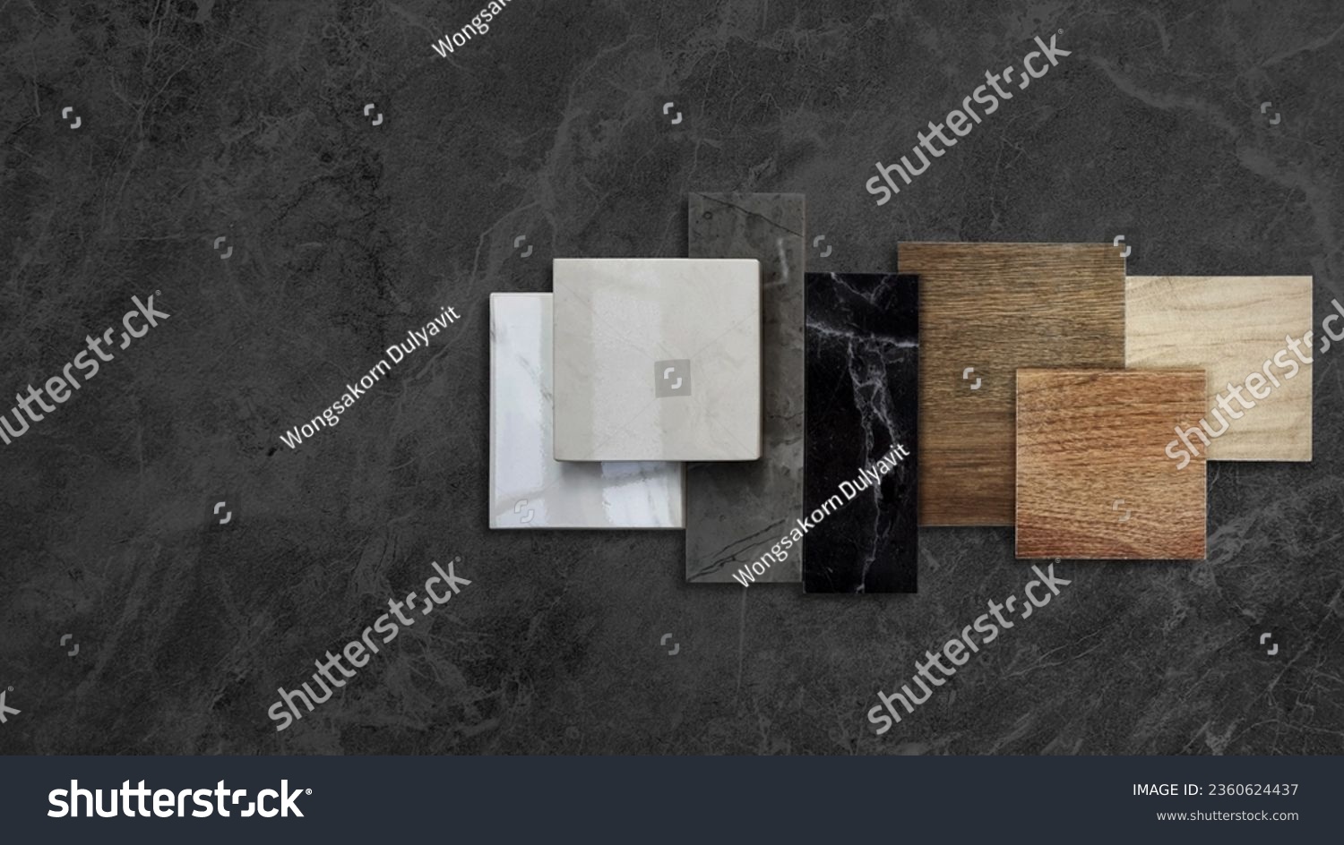 combination of interior material samples placed on dark black marble table including wooden ceramic floor tiles, luxury marble stones, elegance artificial stone tiles with blank space for design. #2360624437