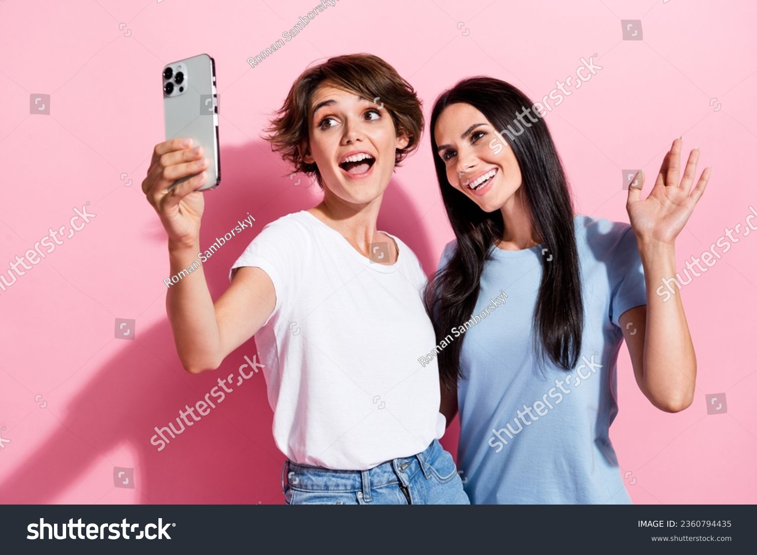 Photo of two best friends girls have fun together selfie shoot iphone weekend party shopping day isolated on pastel pink color background #2360794435