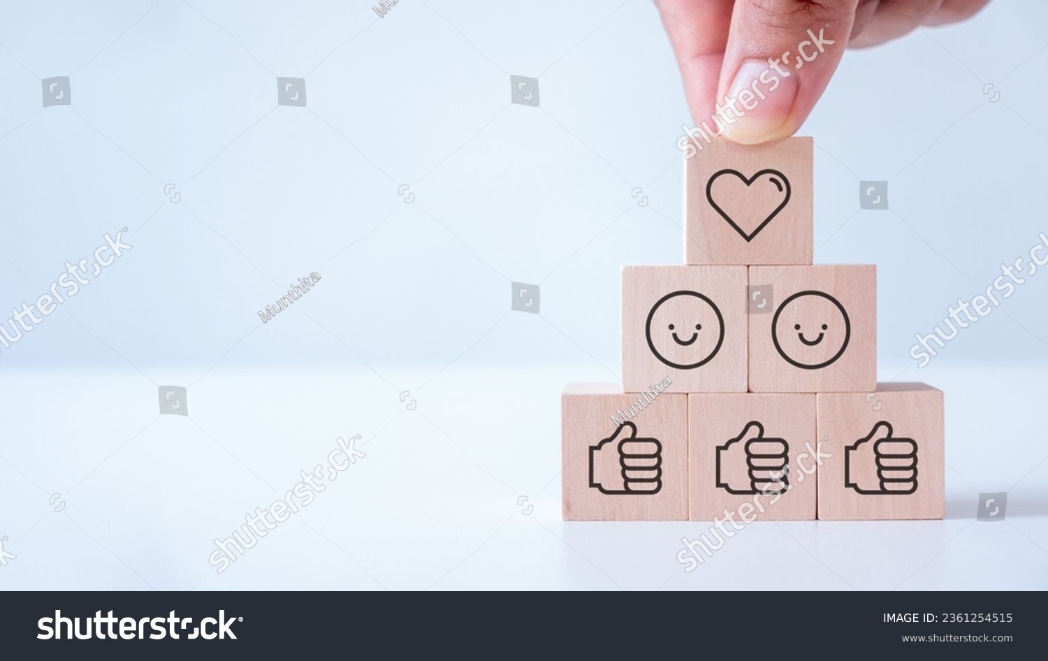 Digital marketing, Social media engagement concept. creating social media platforms to build relationships and drive sales. Sharing customer experiences. Placing the wooden cube blocks with emoticons. #2361254515