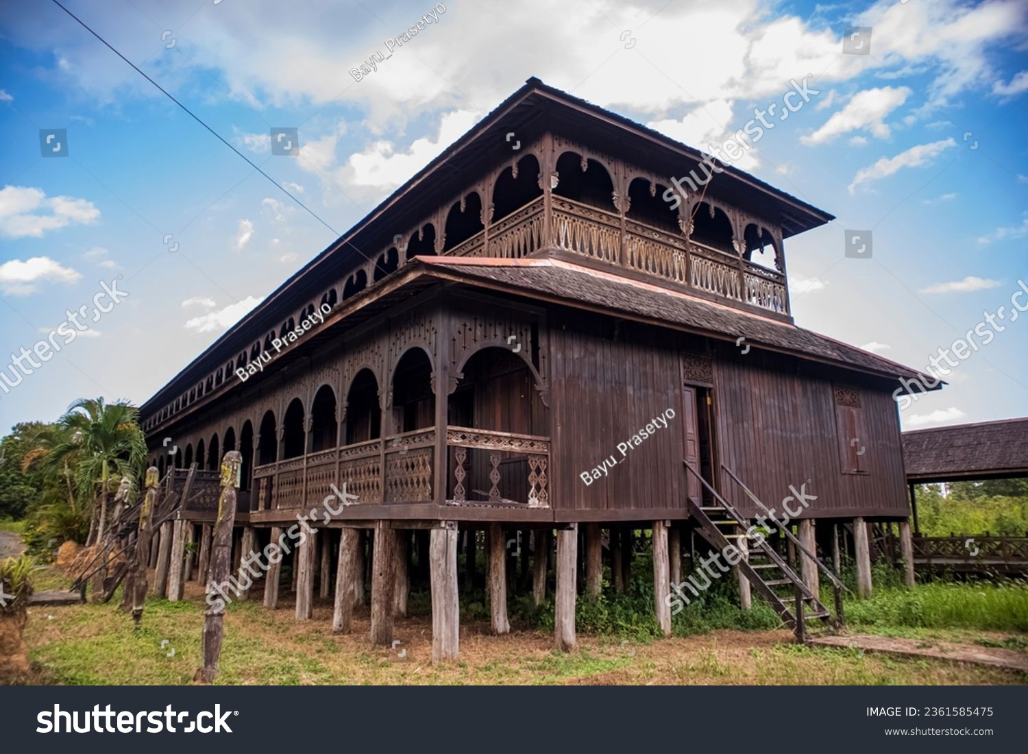 Traditional dayaknese house called "Rumah Panjang" (Long House) in Pulau Kumala, Kutai Kartanegara, East Kalimantan, Indonesia. #2361585475