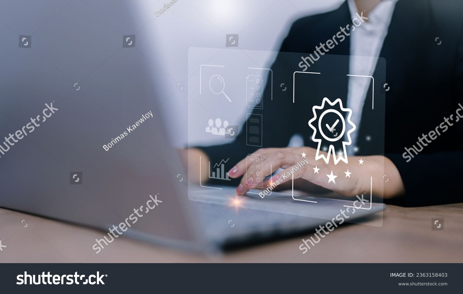 Businesswoman using laptop computer with quality assurance and document icon for ISO or International Standard Organisation which related quality control and continuous improvement concept. #2363158403