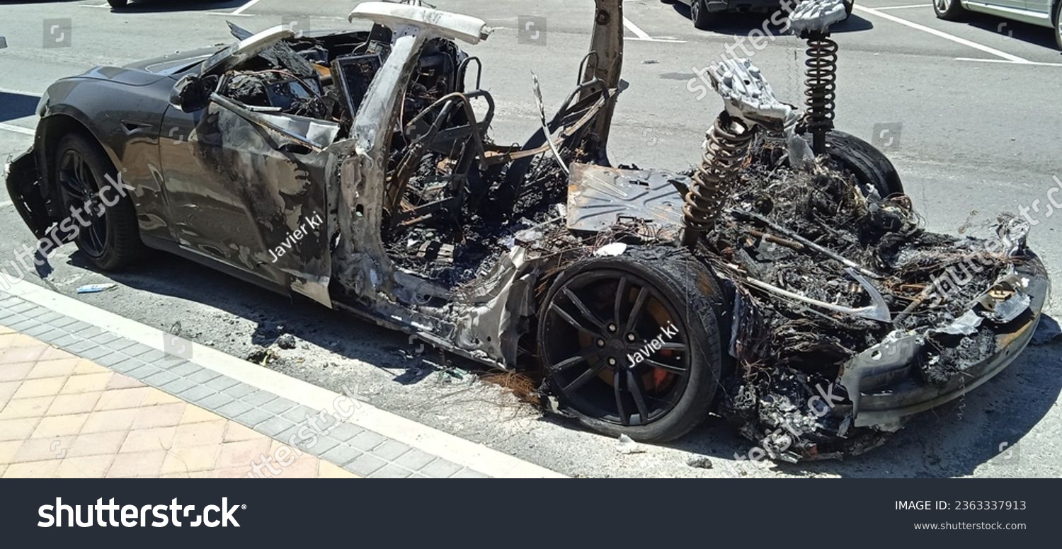Electric car burned lithium battery danger fire insurance car accident #2363337913