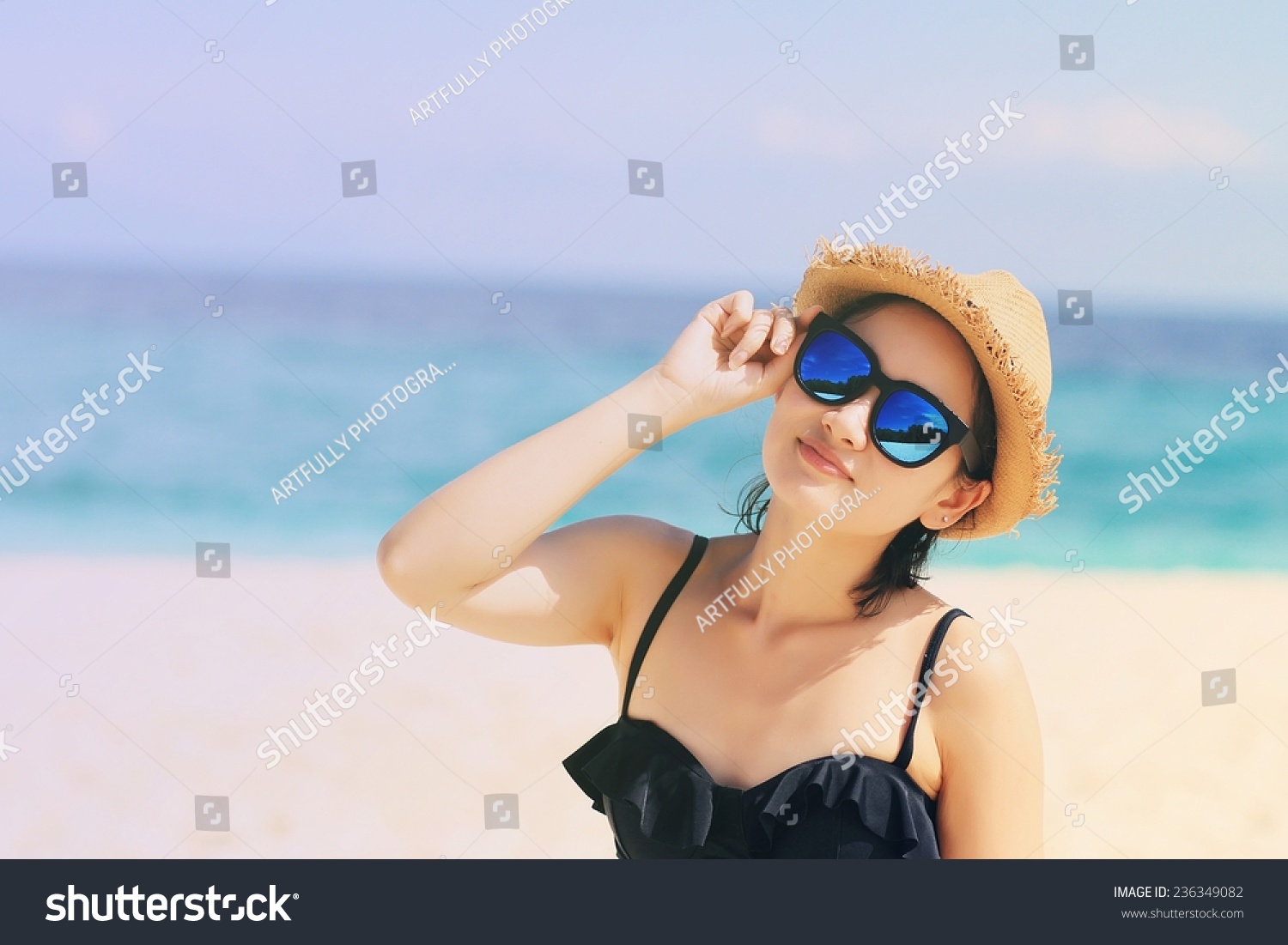 Young beautiful woman on the beach, Woman with sunglasses in bikini. (Color Process) #236349082