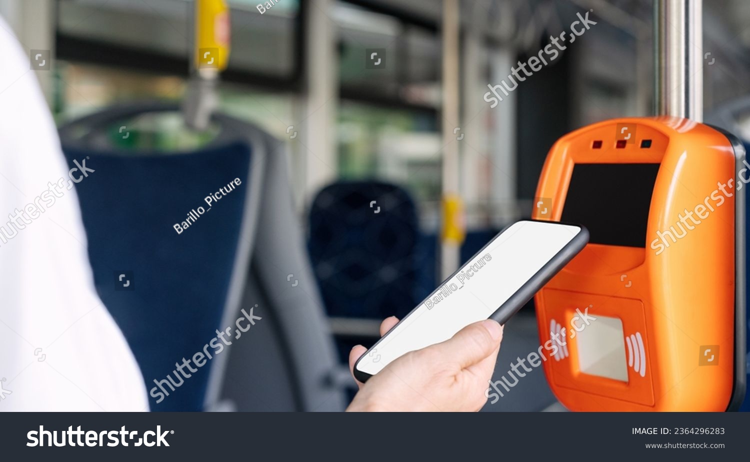 Mobile payment concept, smart phone with empty screen in females hand pays bus travel using contactless technology of phone. #2364296283