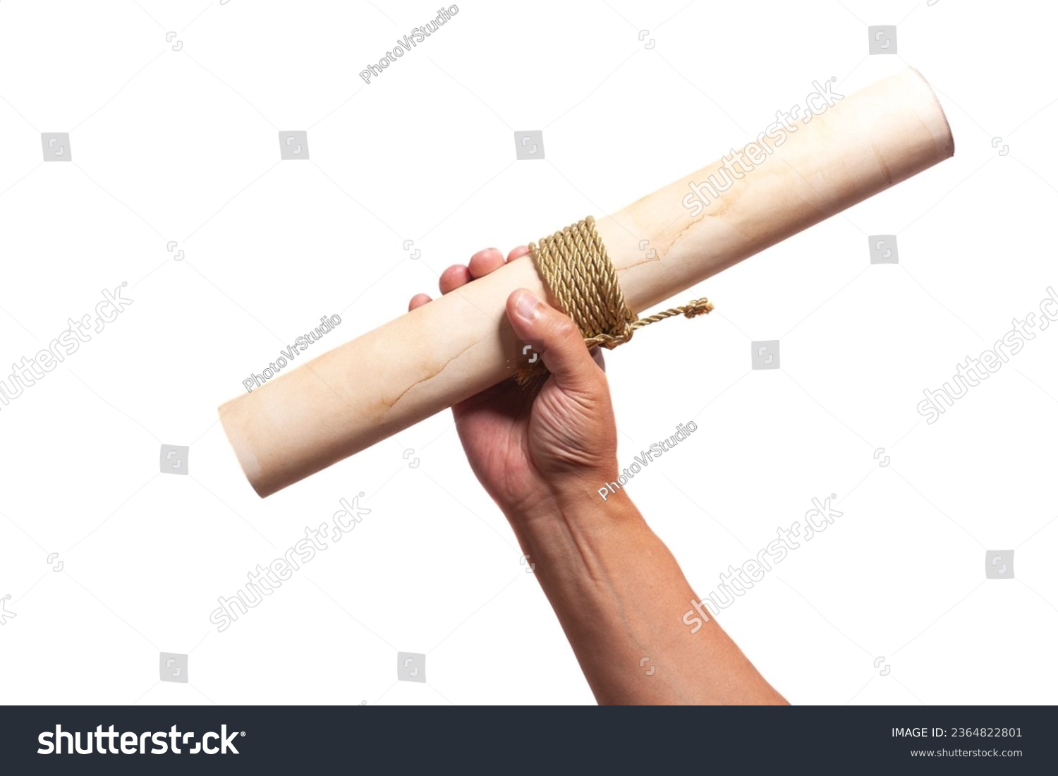 scroll of antique paper tied with a golden rope in hand. #2364822801