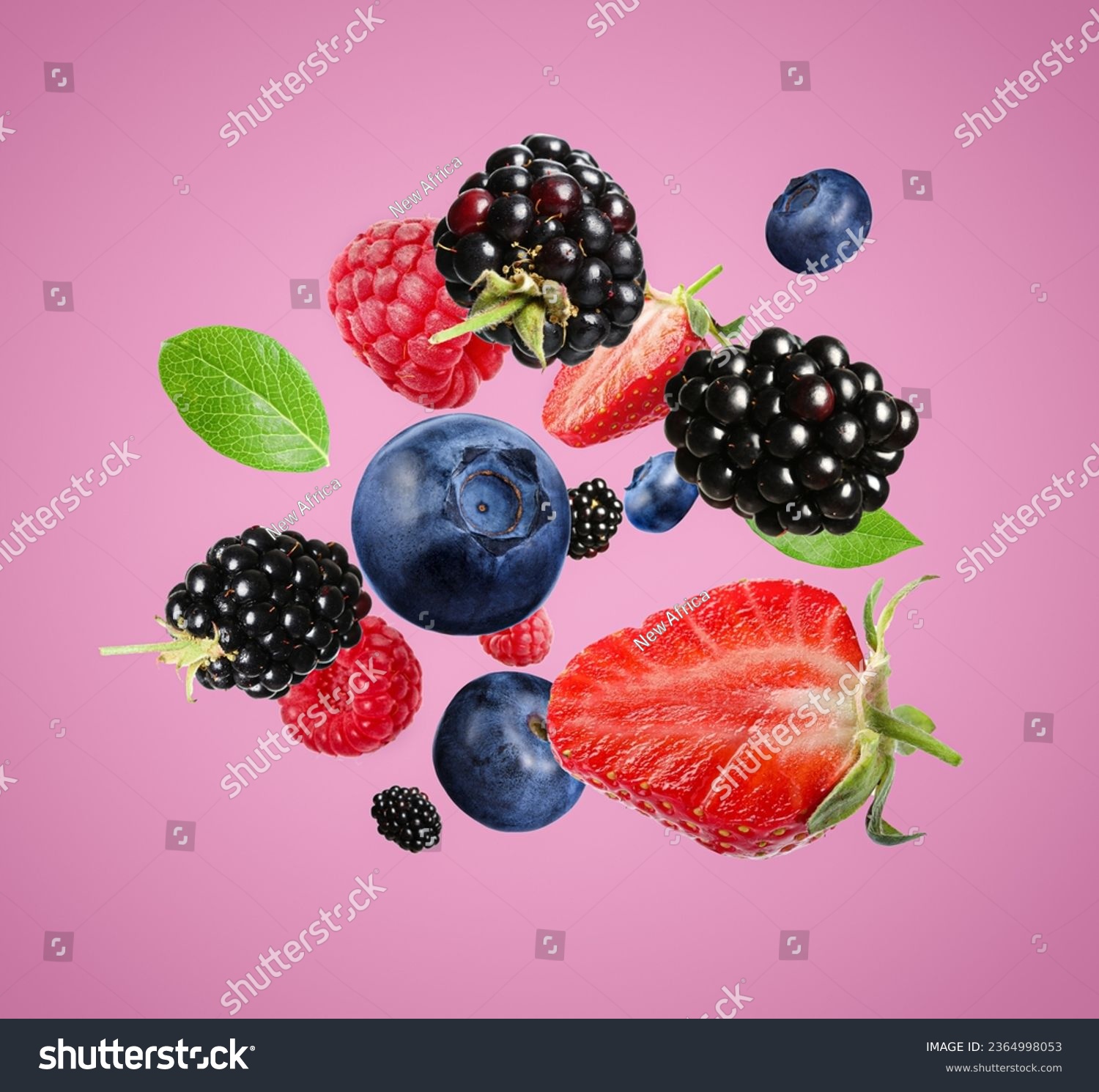 Many different fresh berries falling on hot pink background #2364998053