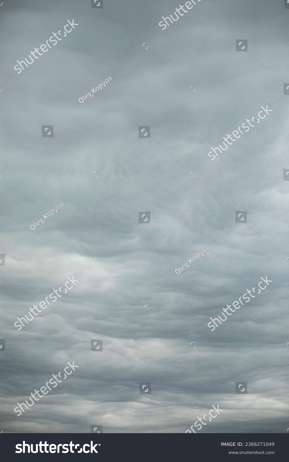 Gray clouds. Low clouds. Gloomy sky. Cloudy weather. #2366271049