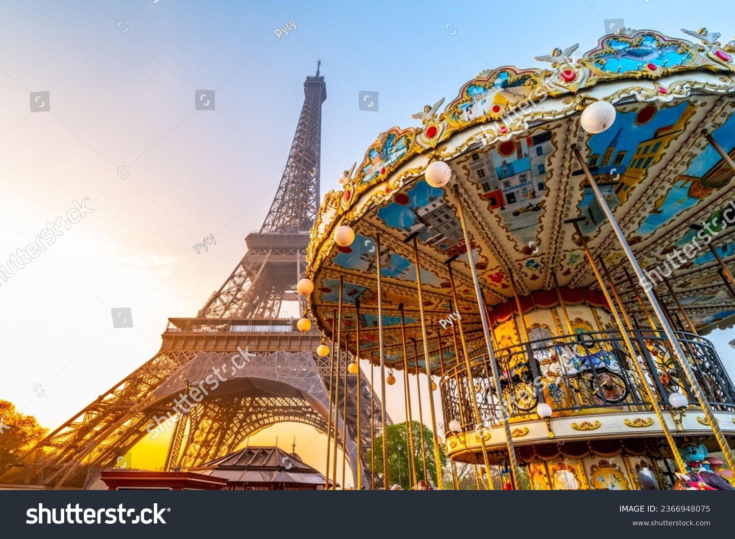 Historical Carousel of the Eiffel Tower. Morning photography at sunrise time. Paris, France #2366948075