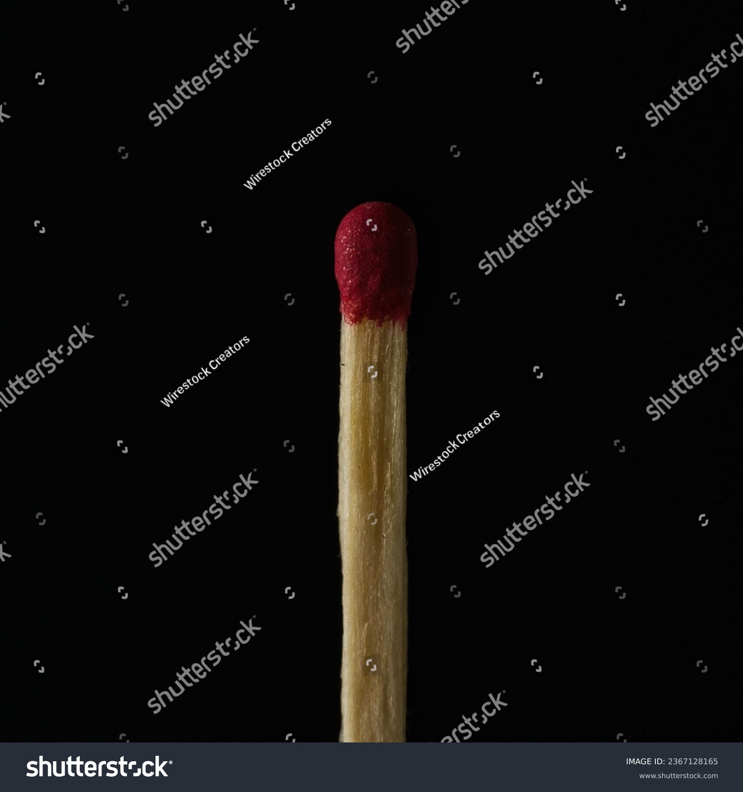 The close-up view of an unlit matchstick before the black background #2367128165