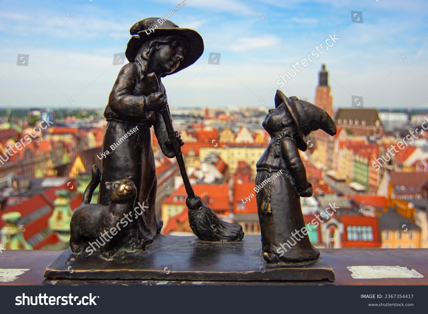 Wroclaw gnomes. Witches Tekla and Martynka (aka Czarownice Tekla i Martynka) on the Penitents Bridge (aka Mostek Pokutnic) between towers of St. Mary Magdalene's Church #2367354417