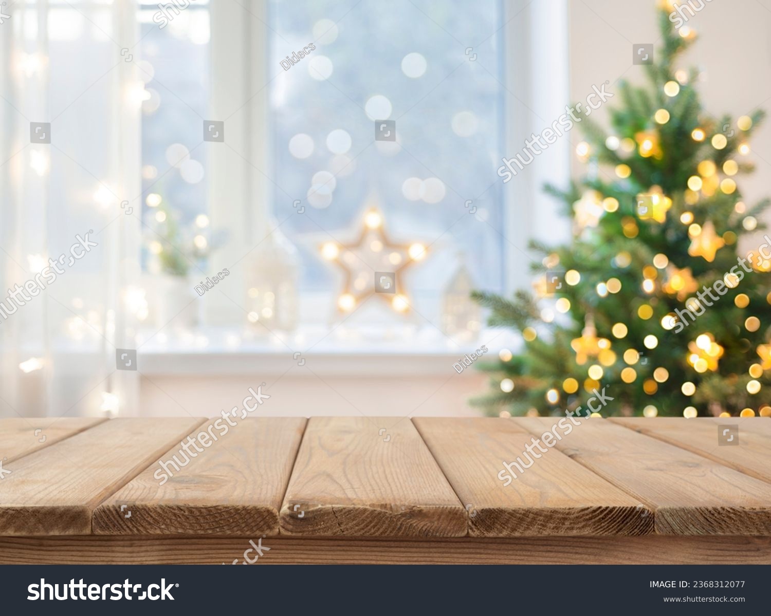 Empty table in front of christmas tree with decoration background #2368312077