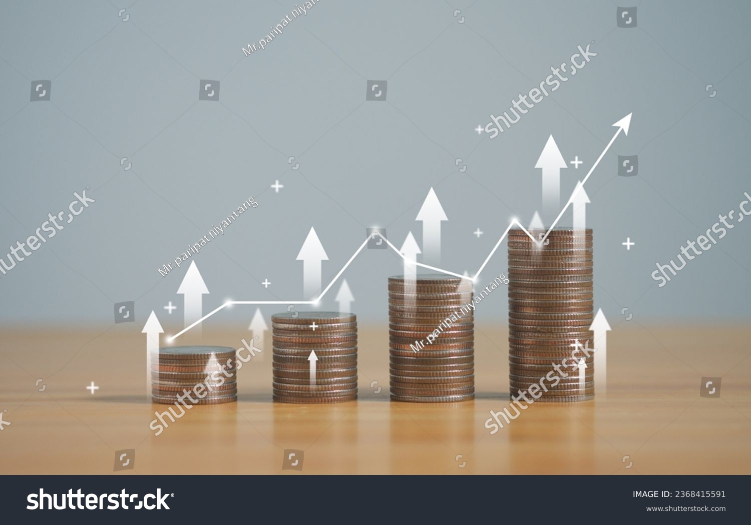 stack of silver coins with trading chart in financial concepts and financial investment business stock growth, for financial banking increase interest rate. #2368415591