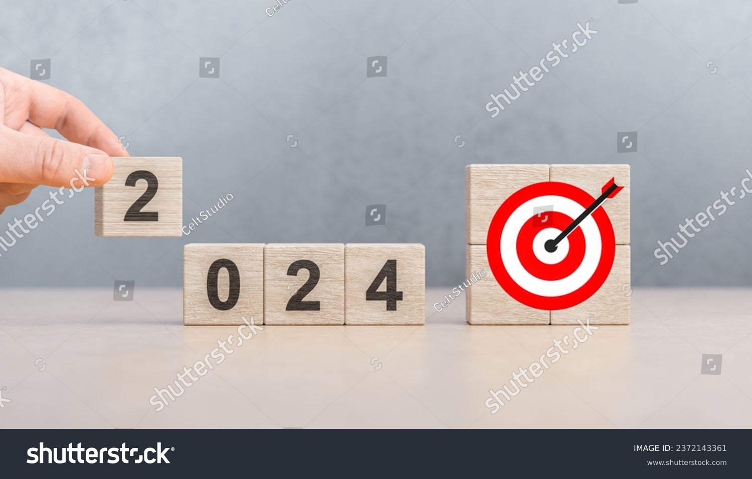 2024 goals of business. Wooden cubes with 2024 and goal icon. Starting 2024 new year. Business common goals for planning new project, annual plan, business target achievement. #2372143361