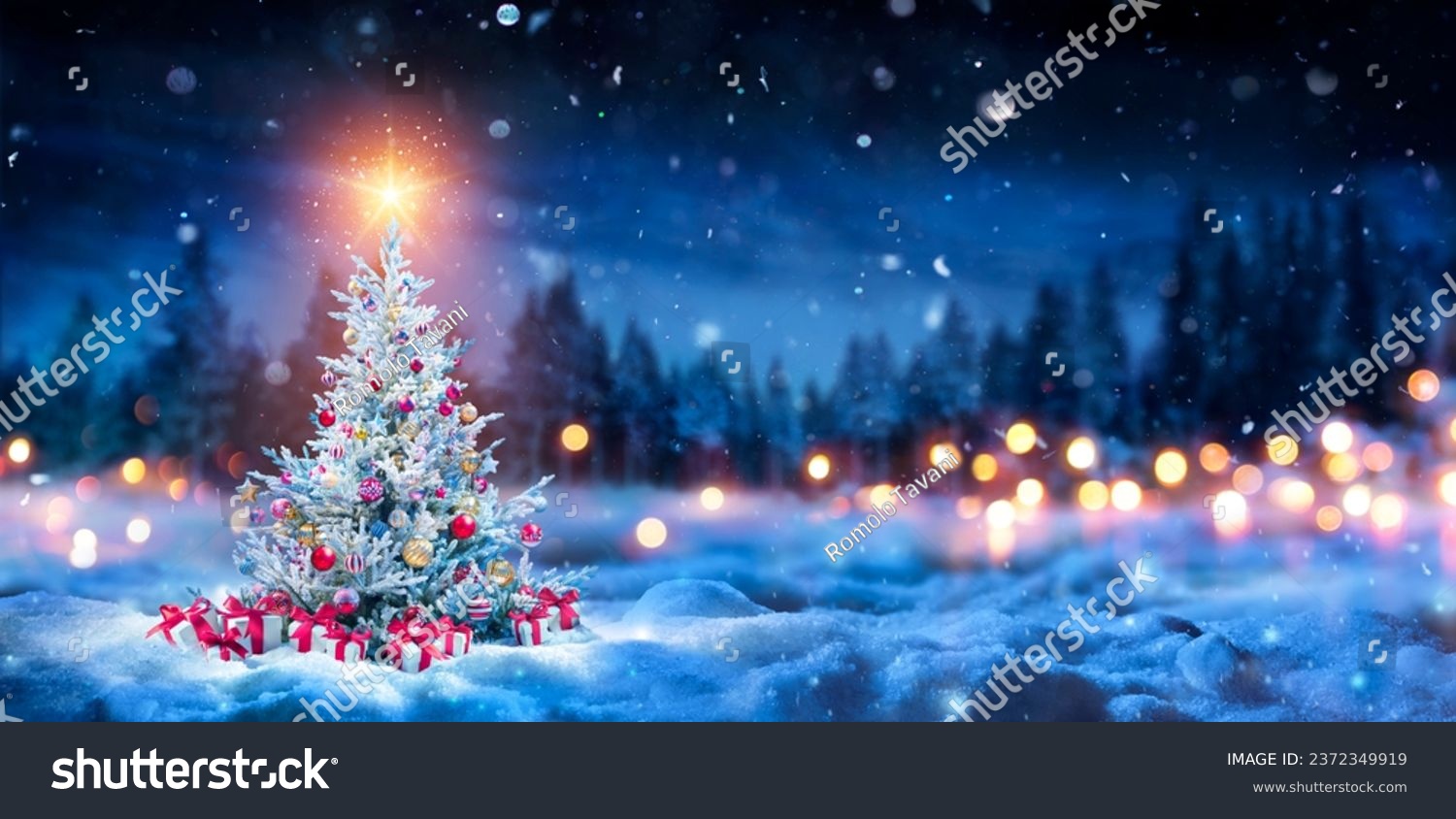 Christmas Tree And Gift Boxes On Snow In Night With Shiny Star and Forest - Winter Abstract Landscape #2372349919