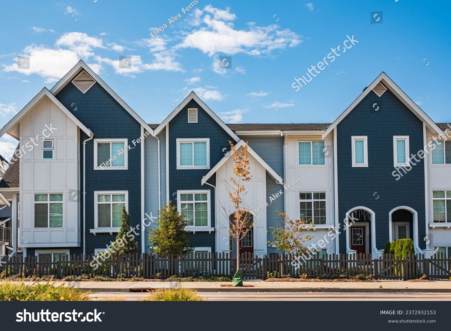 New Modern Apartment Buildings in Vancouver BC. Canadian modern residential architecture on sunny day. Canadian modern residential architecture, low-rise new townhouses. Neighborhood modern houses #2372932153