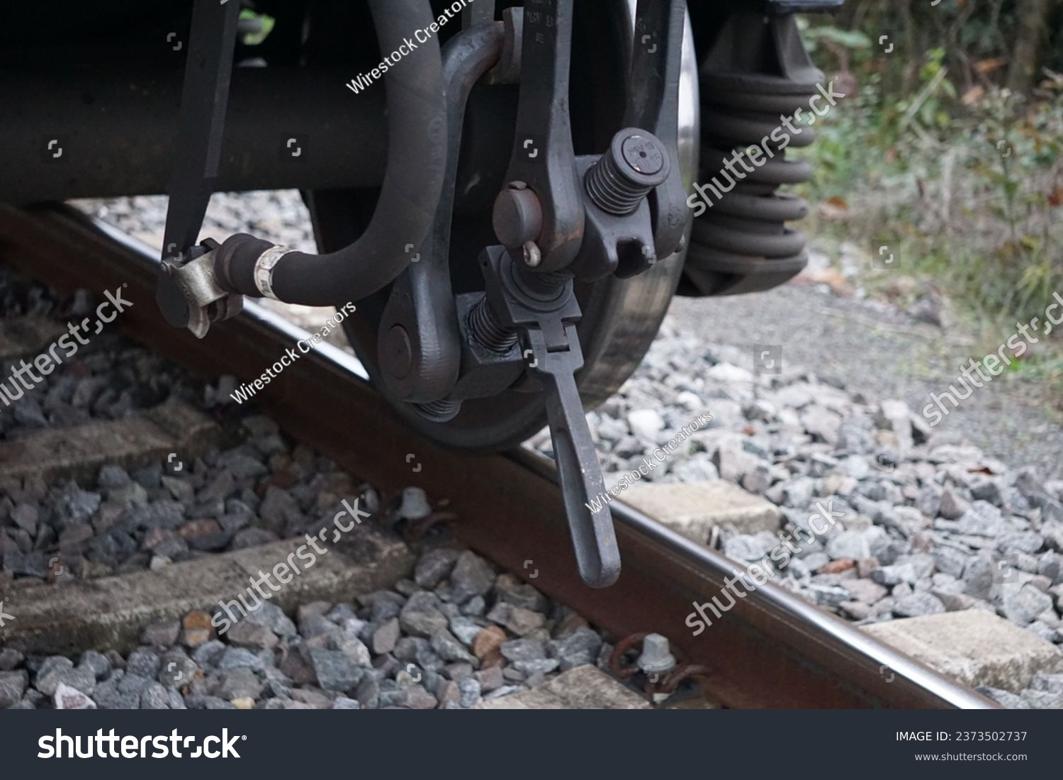A closeup of a tank wagons train details on the railway track #2373502737