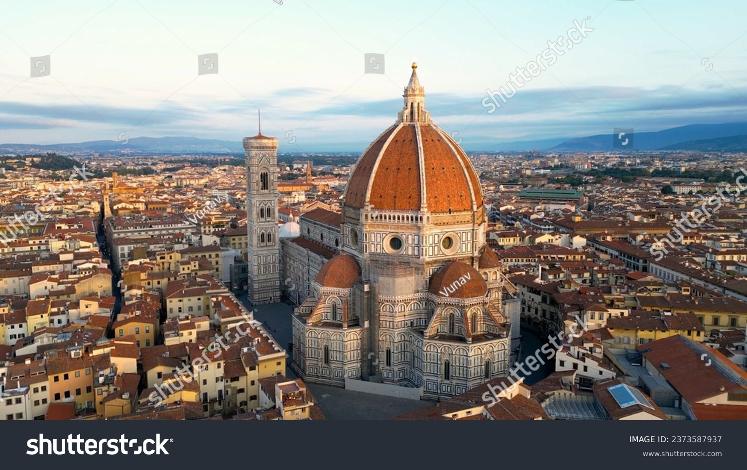 Aerial view of Florence Cathedral (Duomo di Firenze), Cathedral of Saint Mary of the Flower, sunset golden hour, Italy #2373587937
