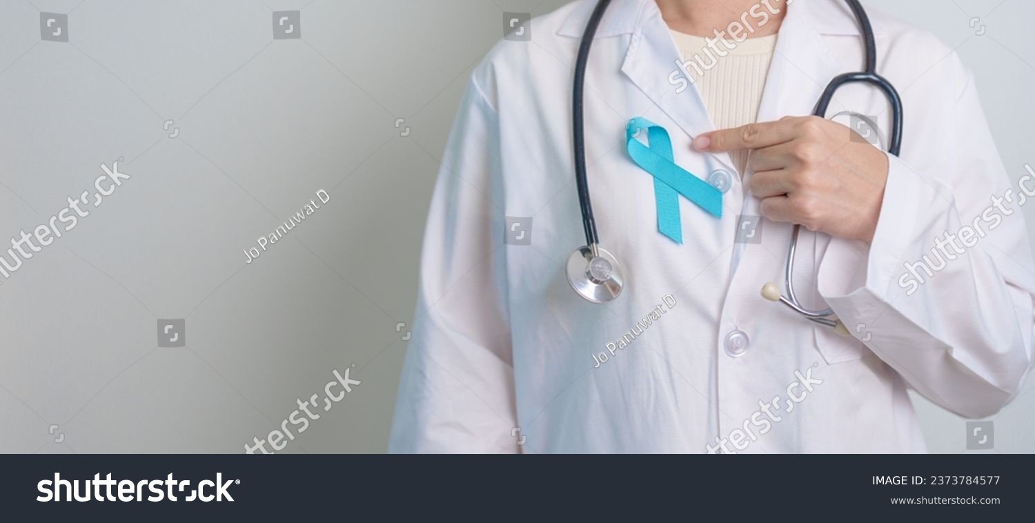 Blue November Prostate Cancer Awareness month, Doctor with Blue Ribbon in hospital for support people life and illness. Healthcare, International men, Father, Diabetes and World cancer day #2373784577
