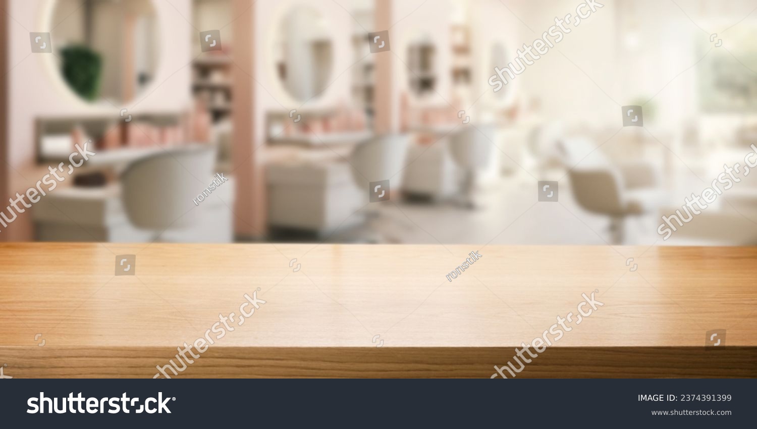 empty brown wooden tabletop for product display on blurred beauty and hair salon interior background #2374391399