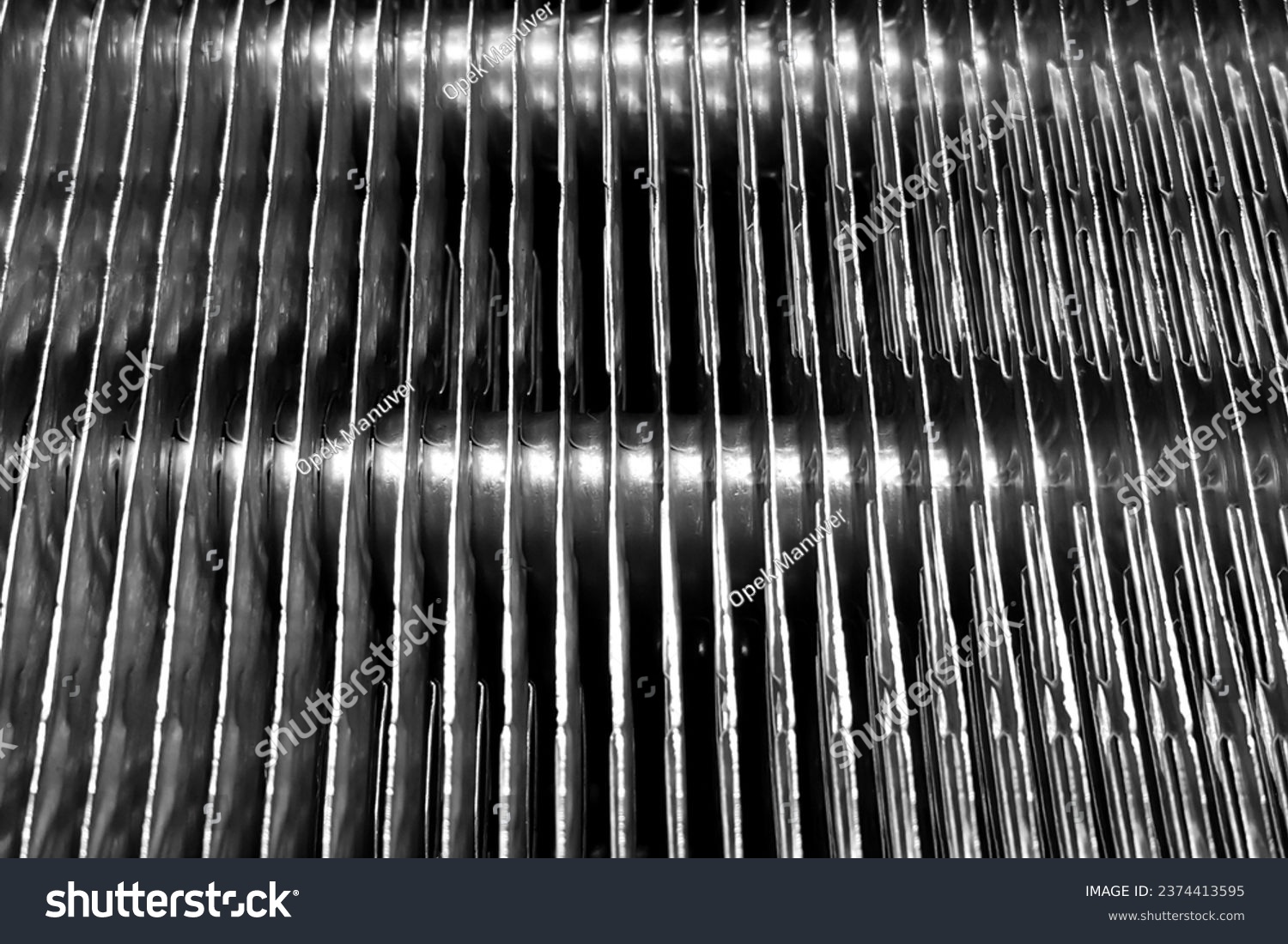 Close-up View of an AC Evaporator Coil with a Grid Radiator Pattern #2374413595