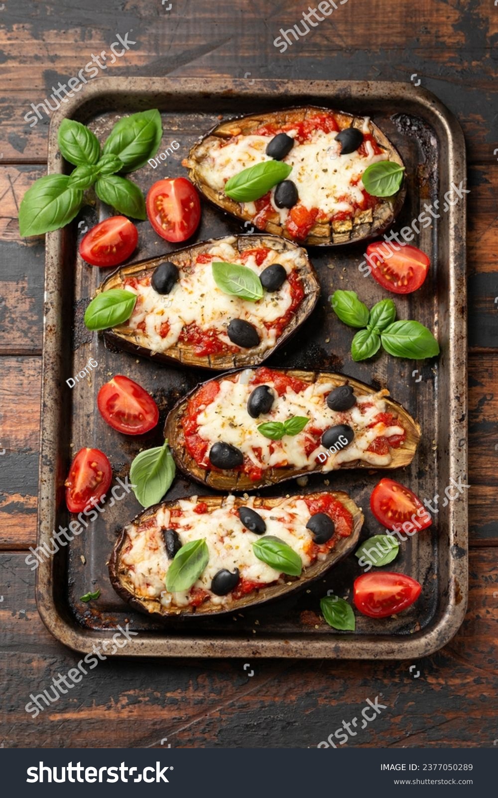 Healthy Eggplant or Aubergine pizza with tomato sauce, mozzarella cheese, basil and olives #2377050289