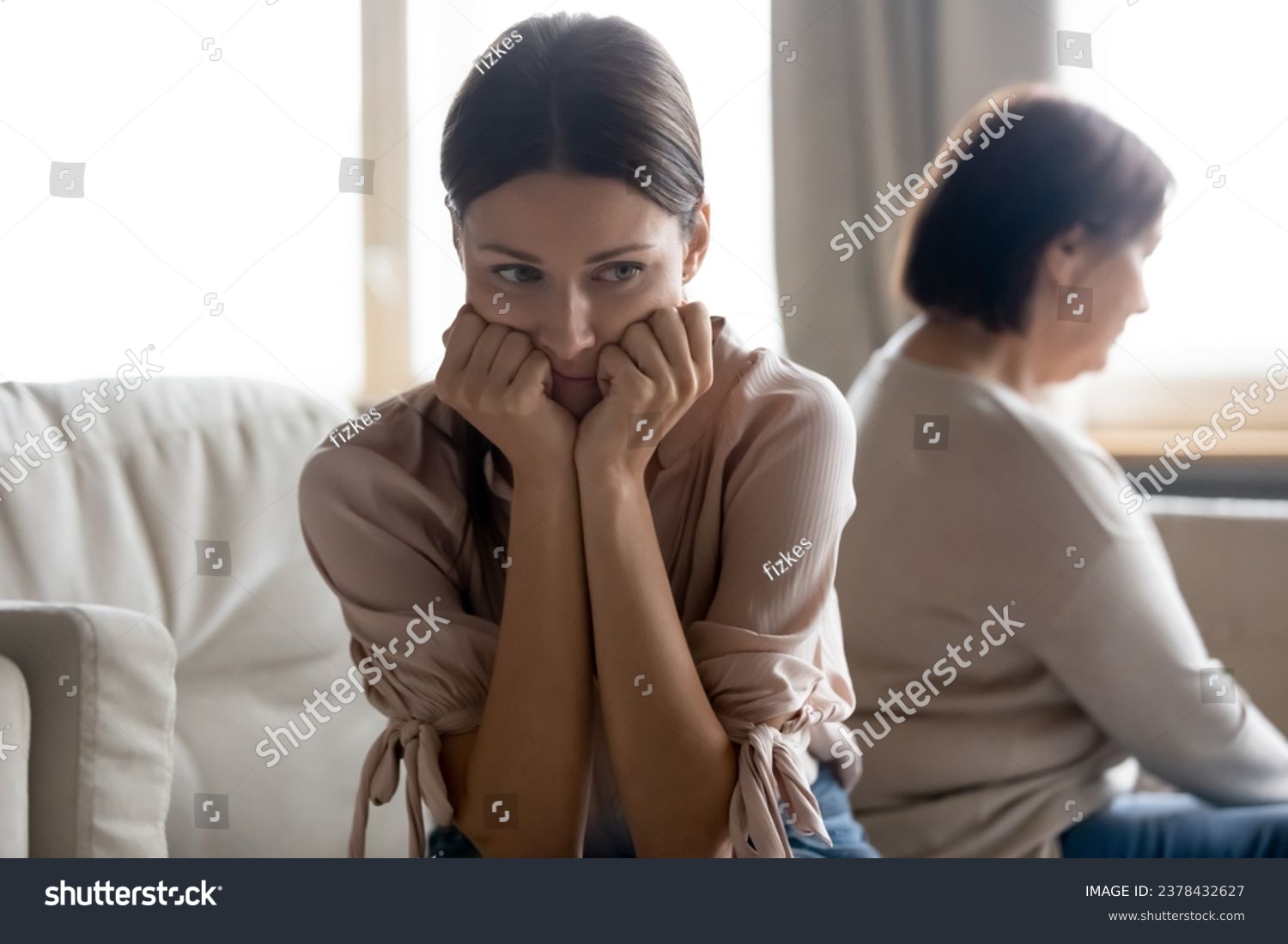 Offended millennial 30s adult daughter and senior mom sit aside back to back avoid talking after quarrel, mother and grown up daughter toxic relations, spoiled relationships, generational gap concept #2378432627