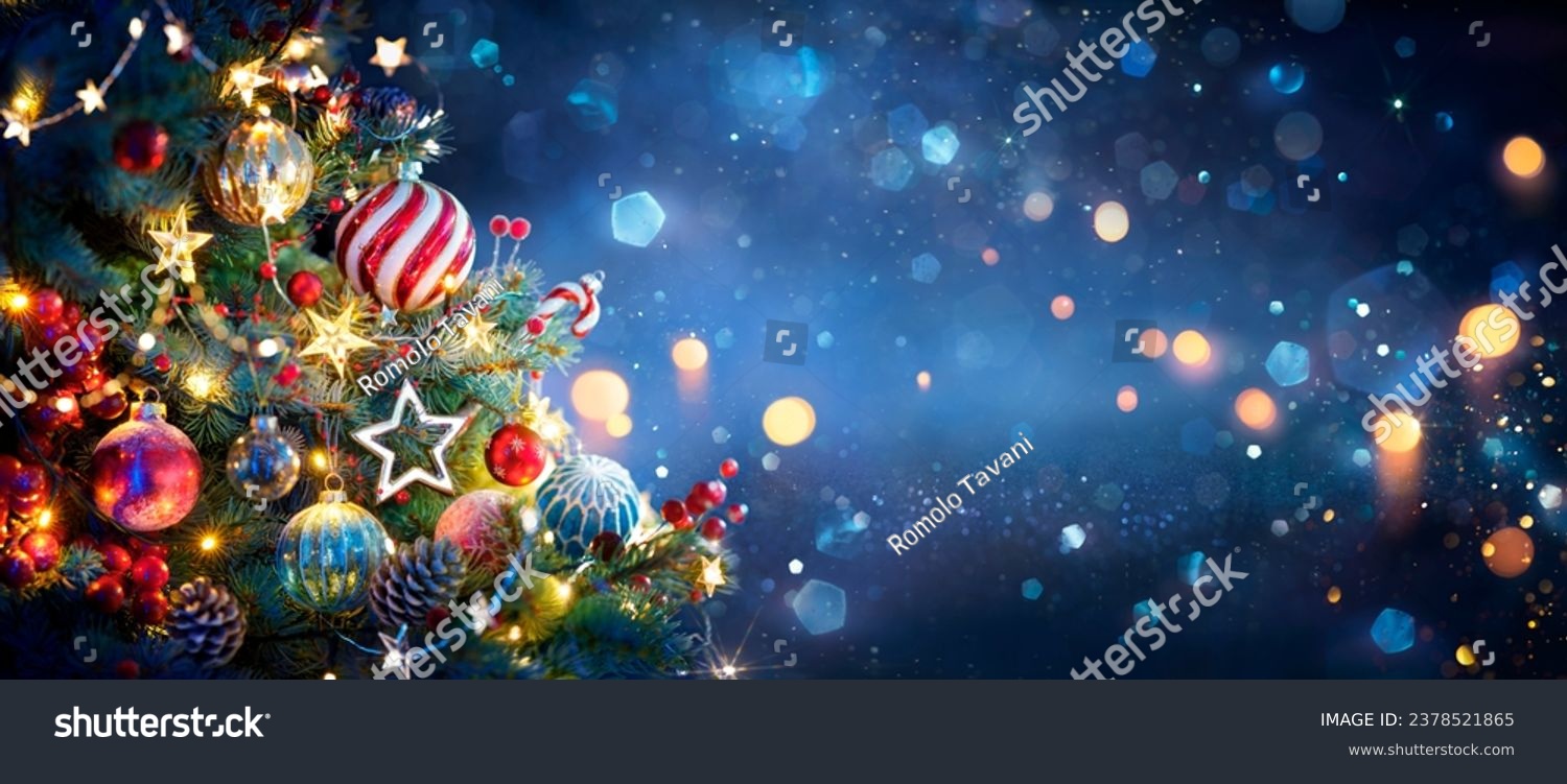 Christmas Tree With Ornaments In Blue And Defocused Lights -  Baubles Hanging On Fir Branches With Glittering In Abstract Background #2378521865