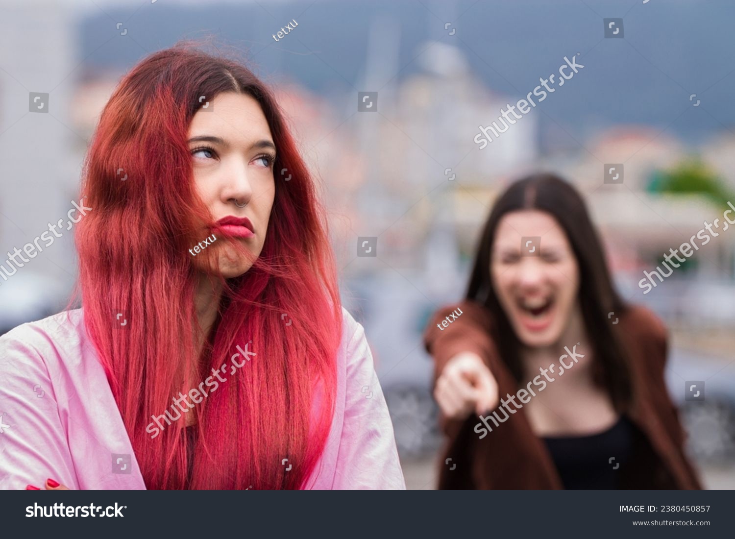 angry women screaming enraged arguing on the street #2380450857
