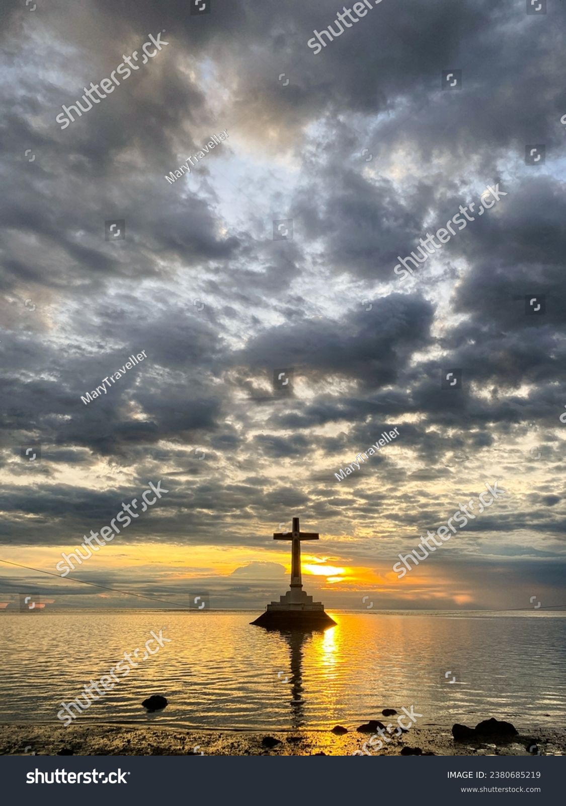 Sunset over the Sunken Cemetery. Beautiful sky and clouds. Camiguin Island. Philippines. #2380685219