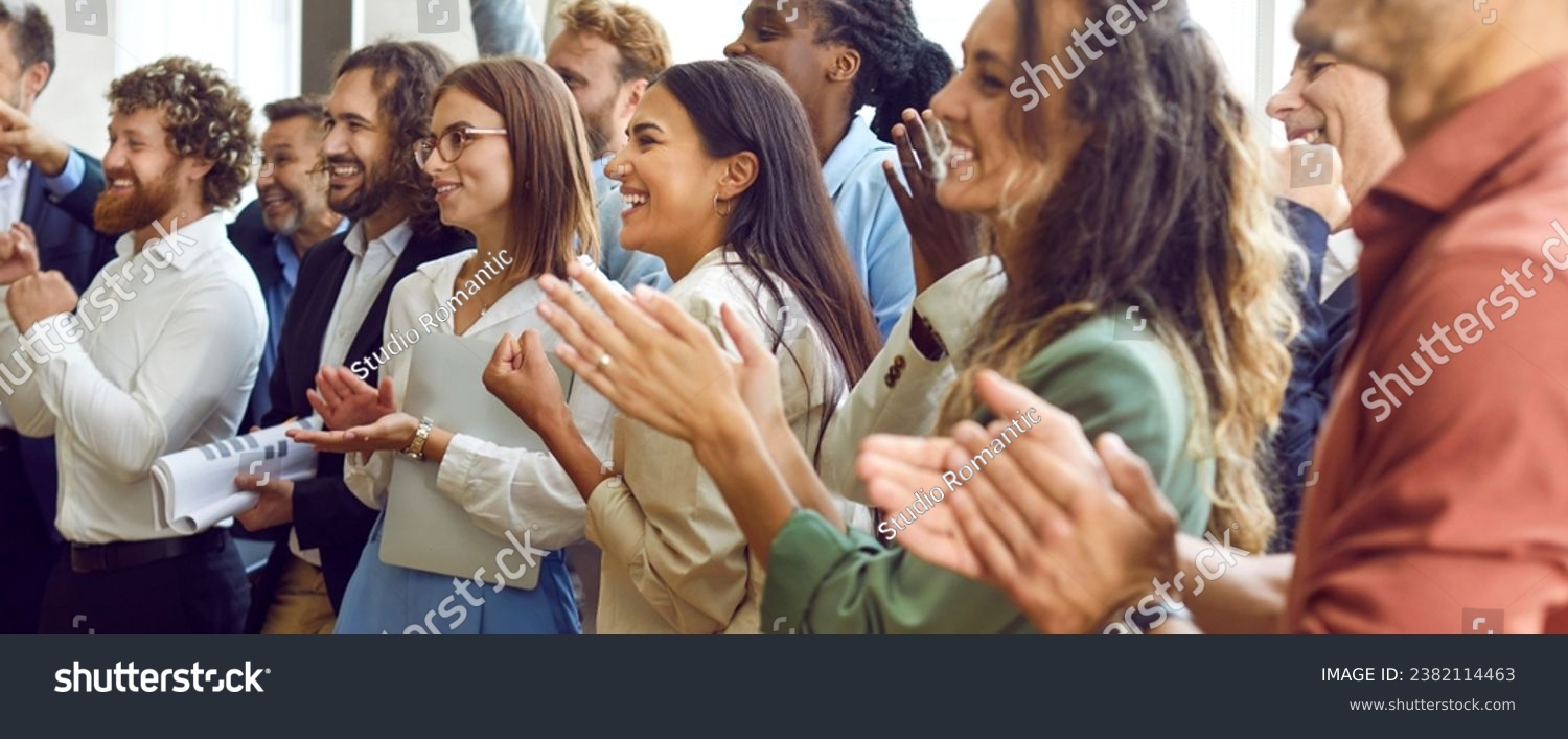 Applauding people. Happy satisfied audience joyfully applauding during business conference or seminar. Side view portrait of smiling men and women clapping their hands. Panoramic web banner. #2382114463