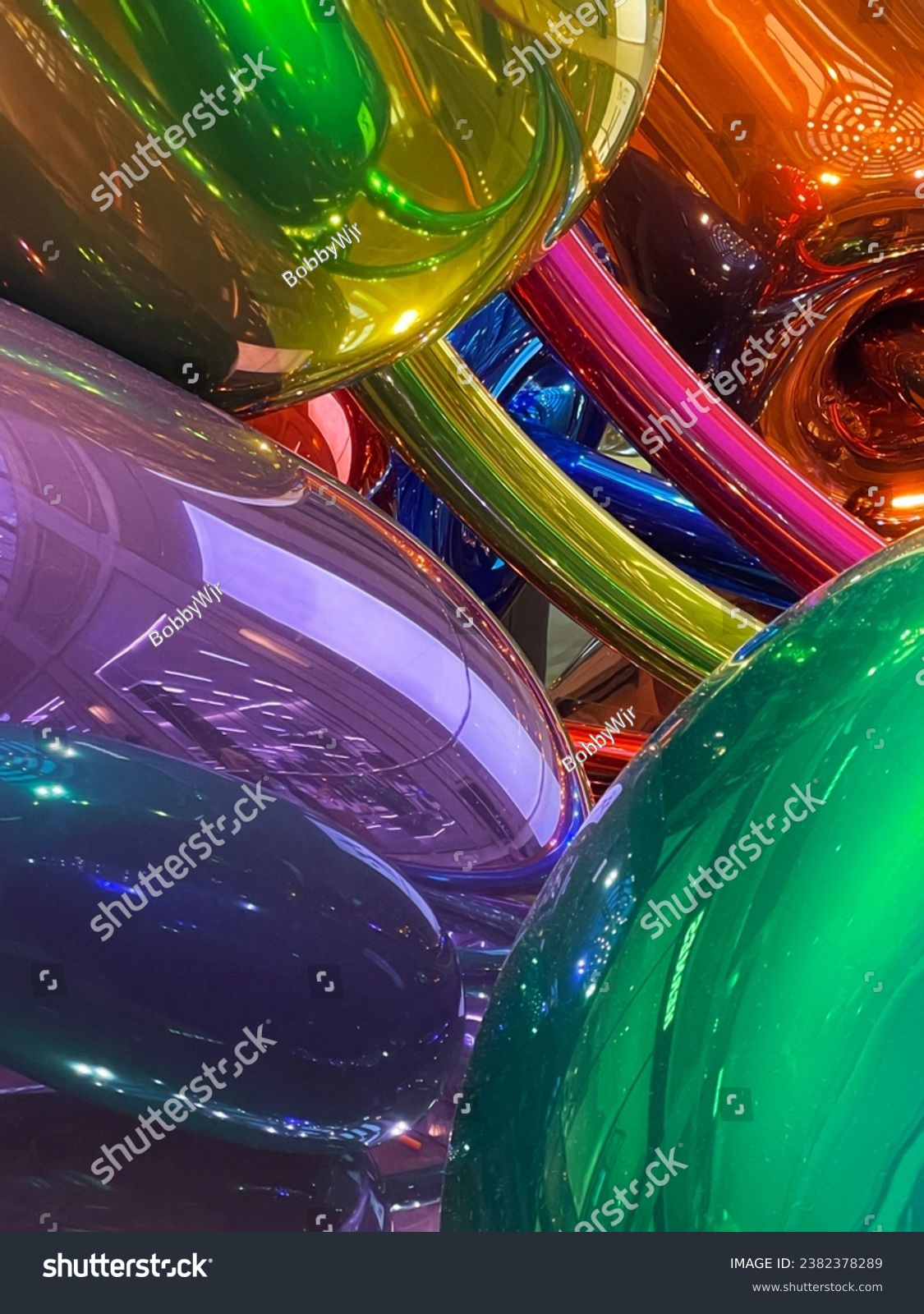colorful abstract reflective balloons mixed together #2382378289