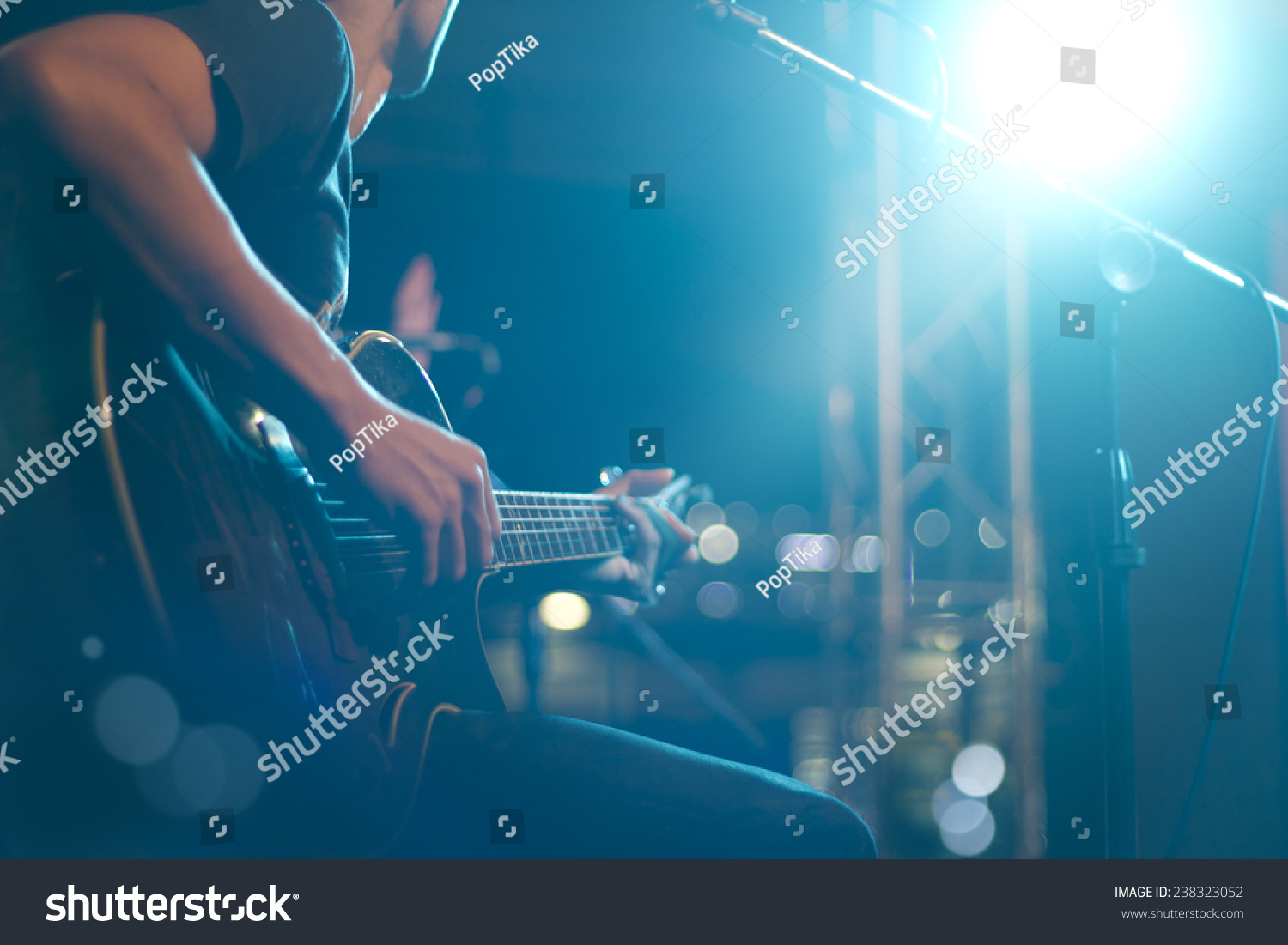 Guitarist on stage for background, soft and blur concept #238323052