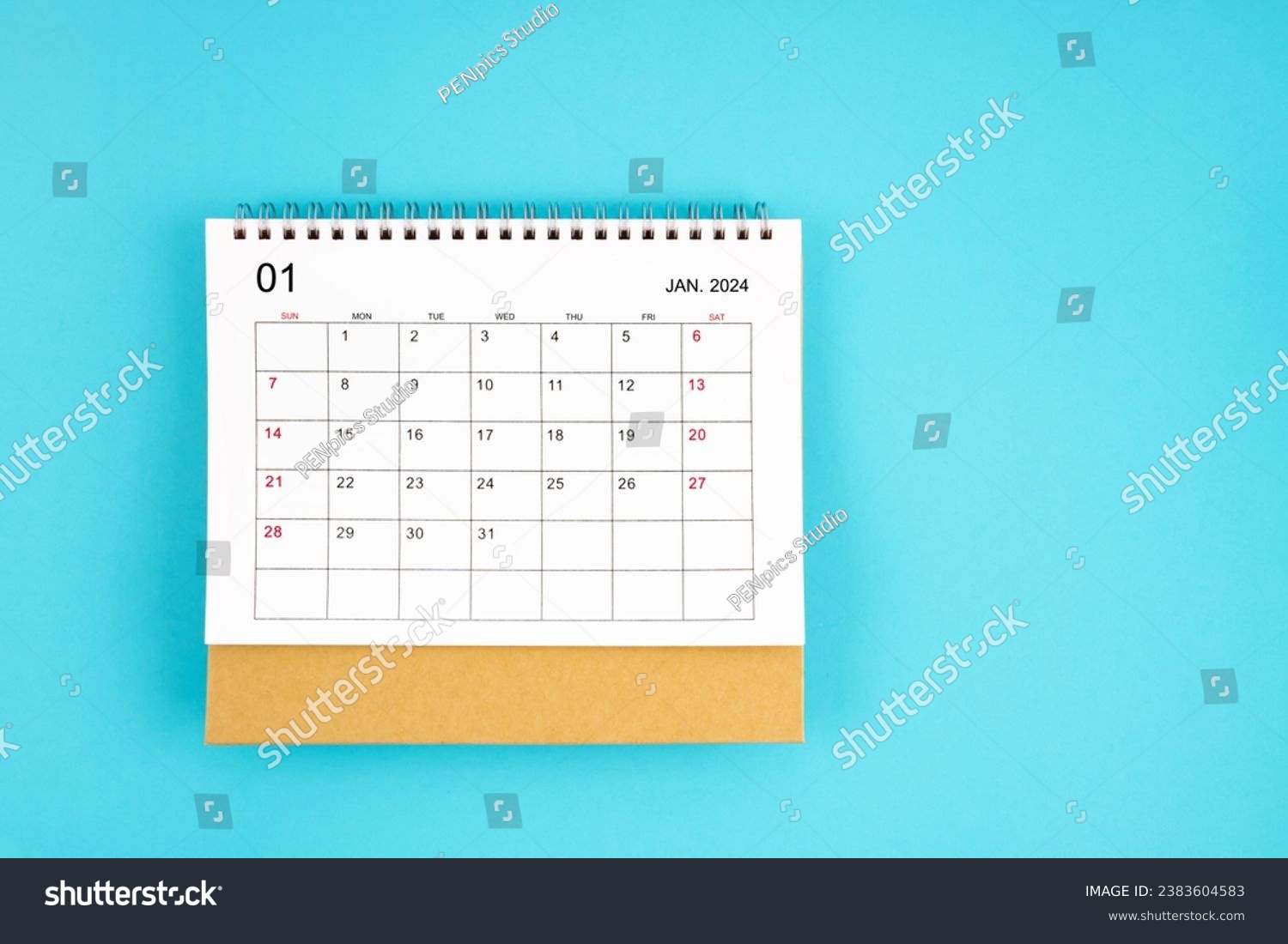 January 2024, Monthly desk calendar for 2024 year on blue color background. #2383604583