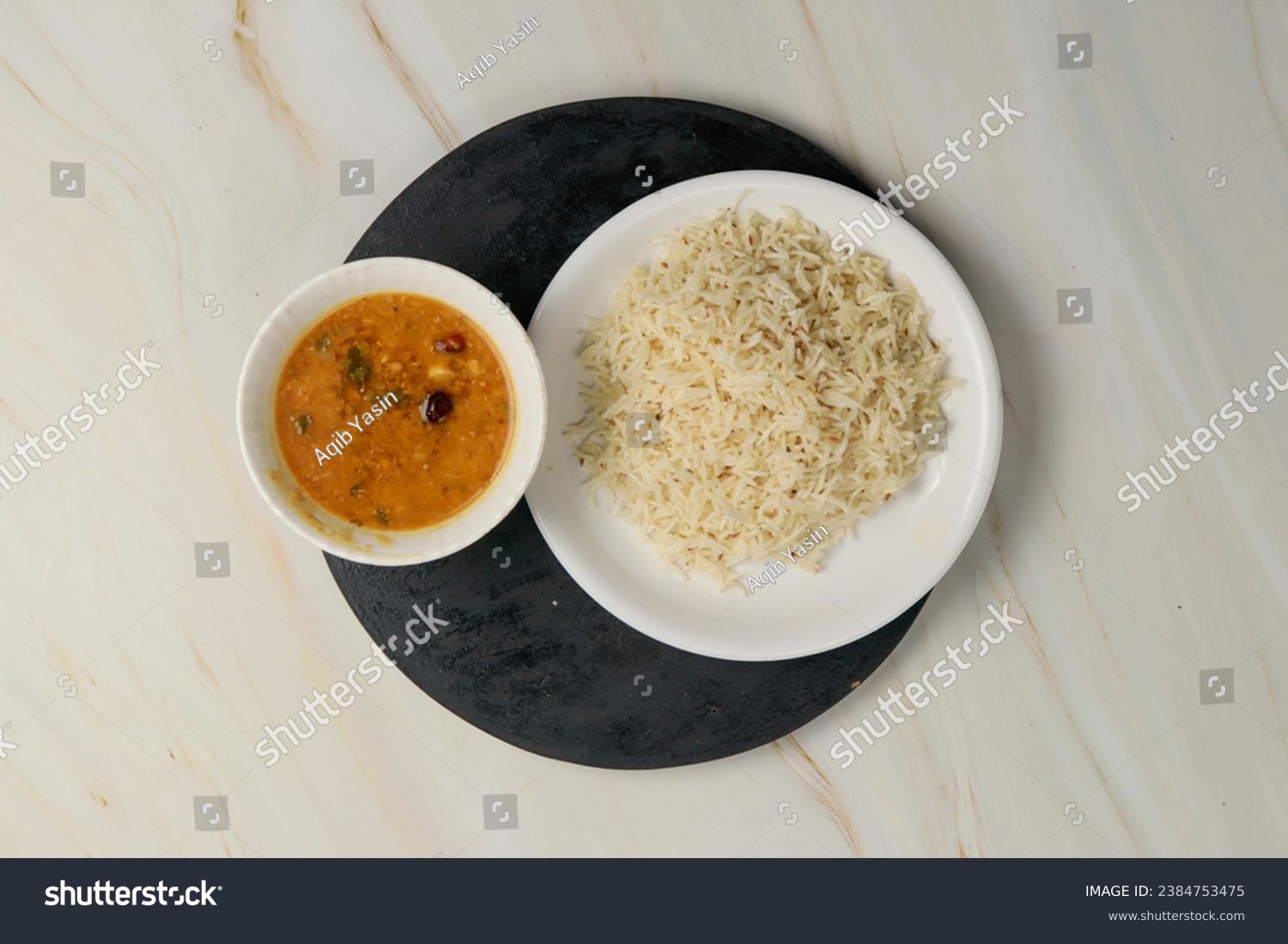 Indian Traditional Cuisine Dal Fry or Rice Also Know as Dal Chawal, Daal Chawal, Dal Rice, Whole Yellow Lentil with Rice or Dal Tadka, Daal Fry Served with Rice #2384753475
