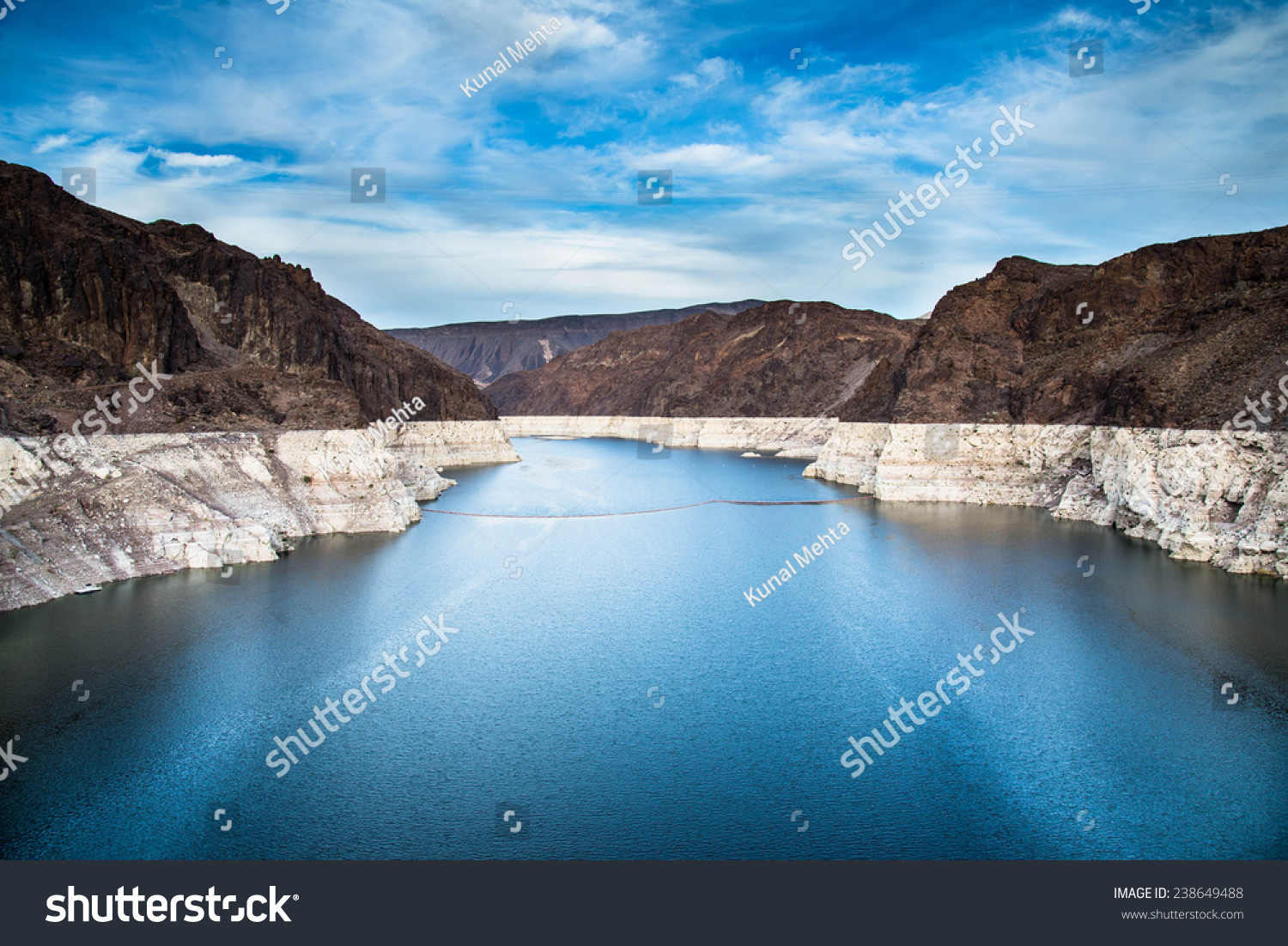 Hoover dam and Lake Mead in Las Vegas area. Hoover Dam is a major tourist attraction on Nevada / Arizona border #238649488