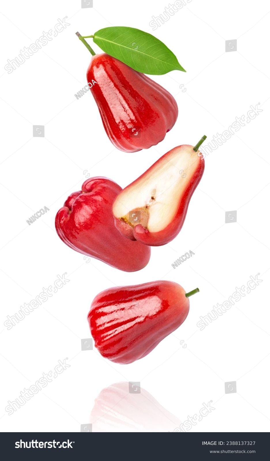 Red rose apple fruit with green leaf flying in the air isolated on white background. #2388137327